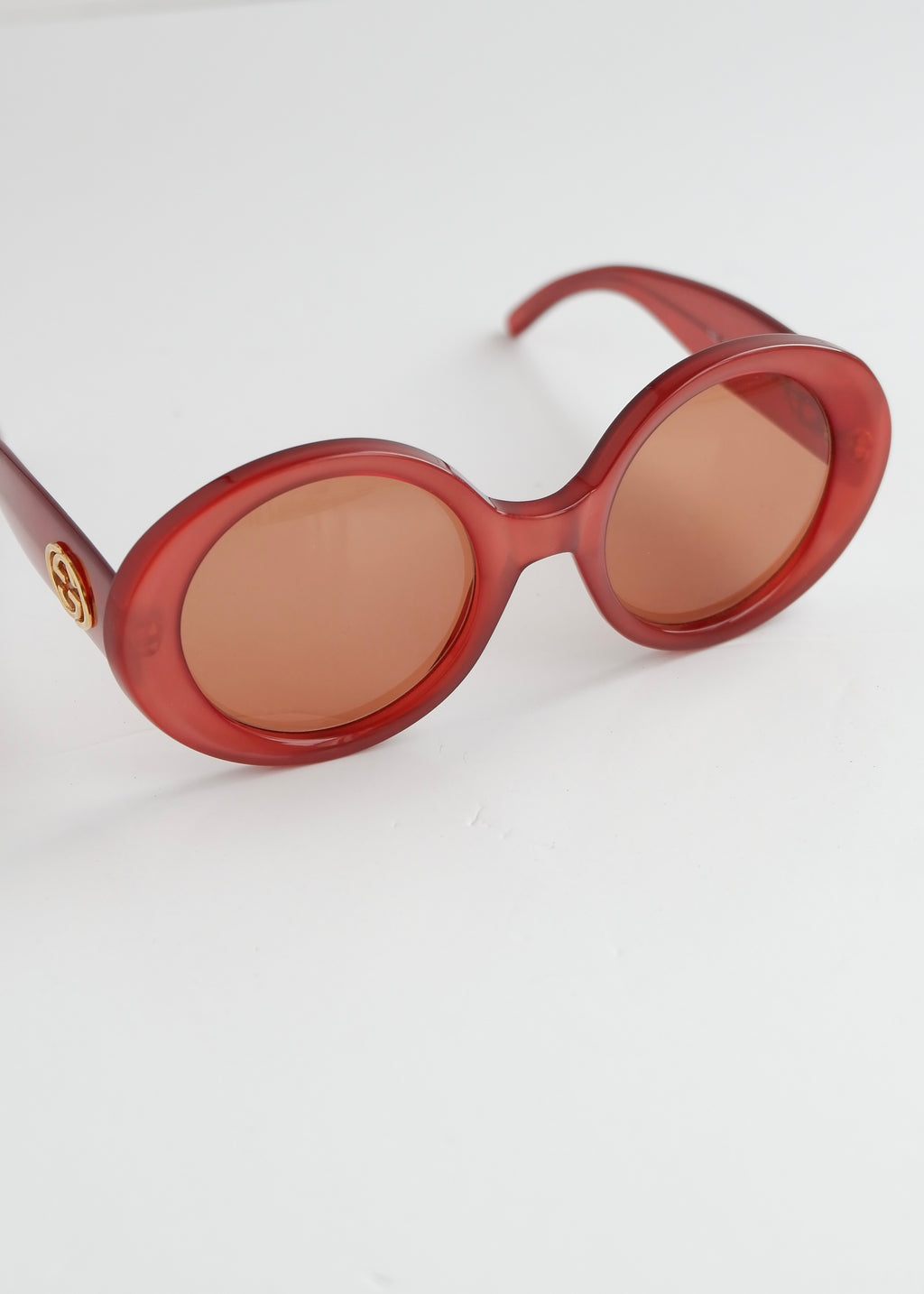 Authentiques lunettes de soleil Gucci rouges à monture ronde d'occasion