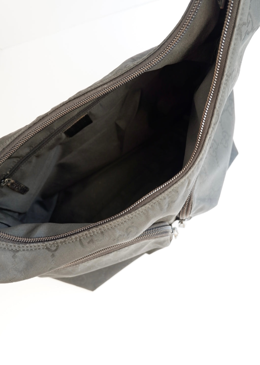 Authentique Sac à bandoulière Gucci en toile GG noire d'occasion