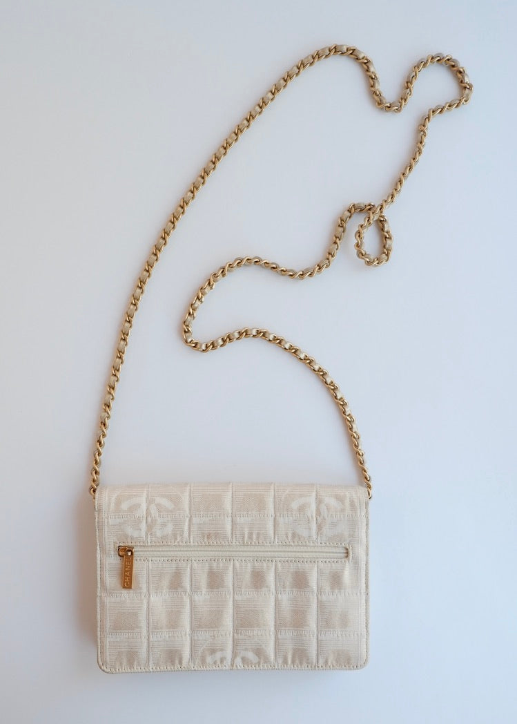 Authentic Preowned Chanel Gold Canvas New Travel Line WOC Bag