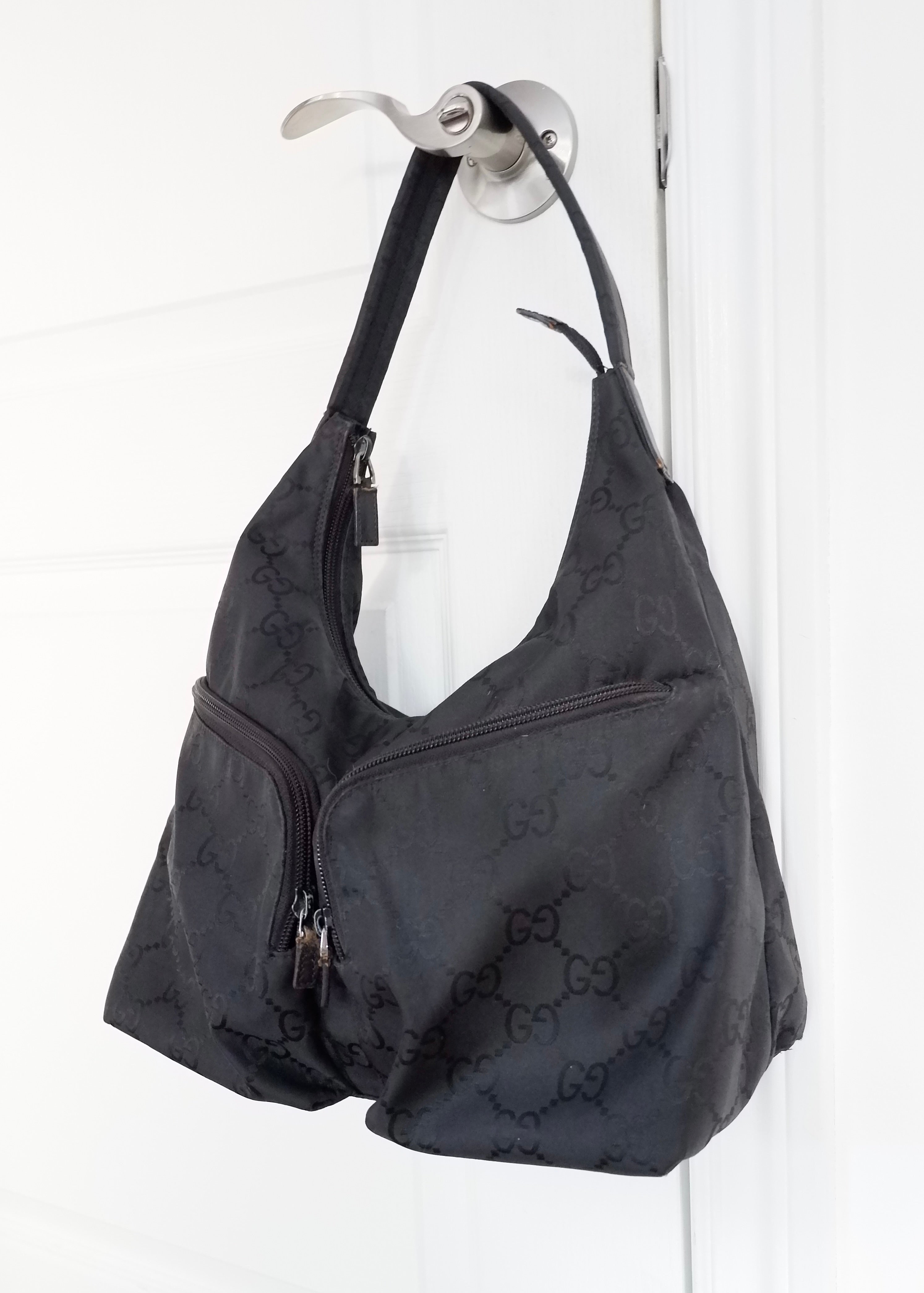 Authentique Sac à bandoulière Gucci en toile GG noire d'occasion
