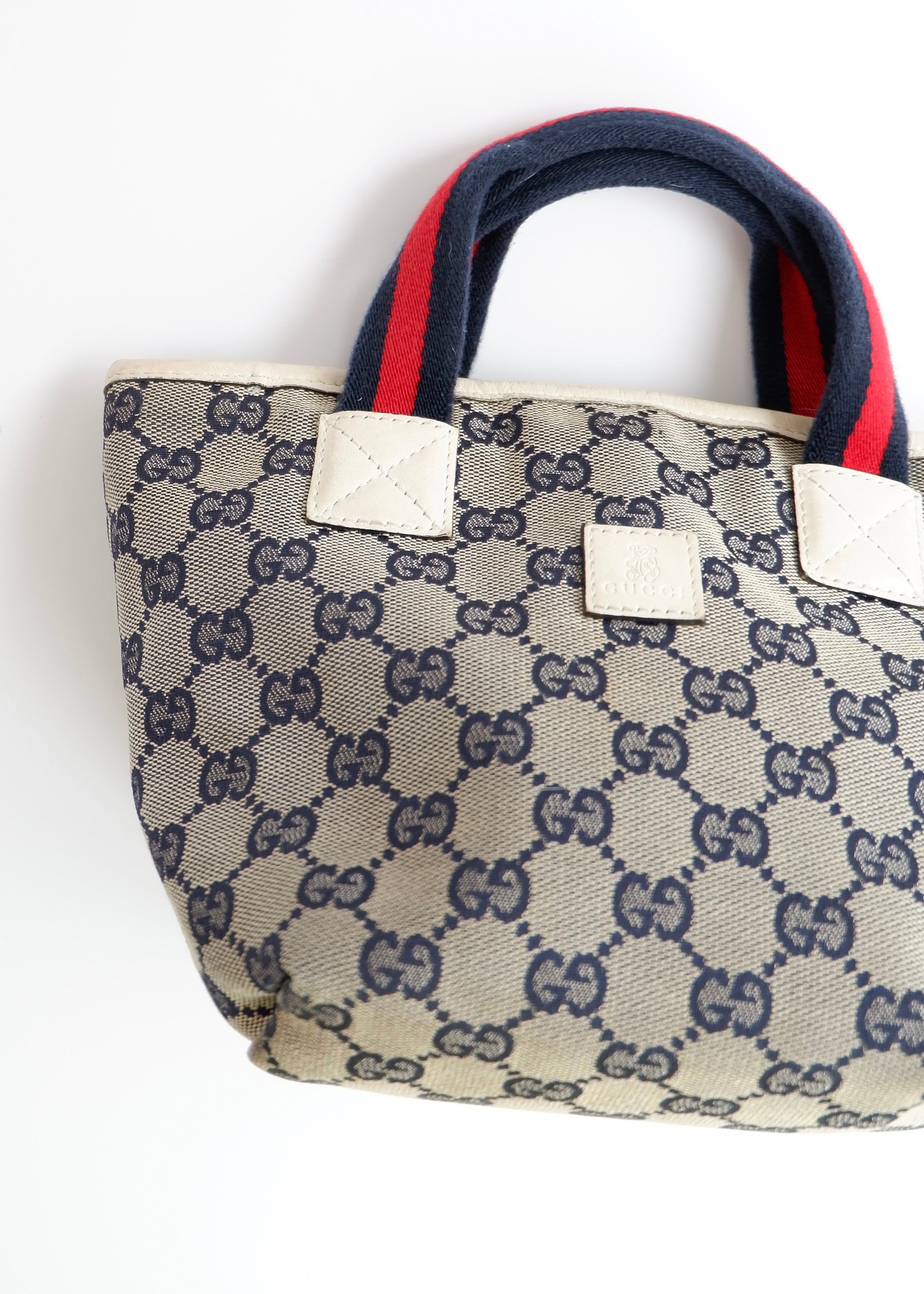 Authentic Preowned Gucci Navy GG Canvas Micro Handbag