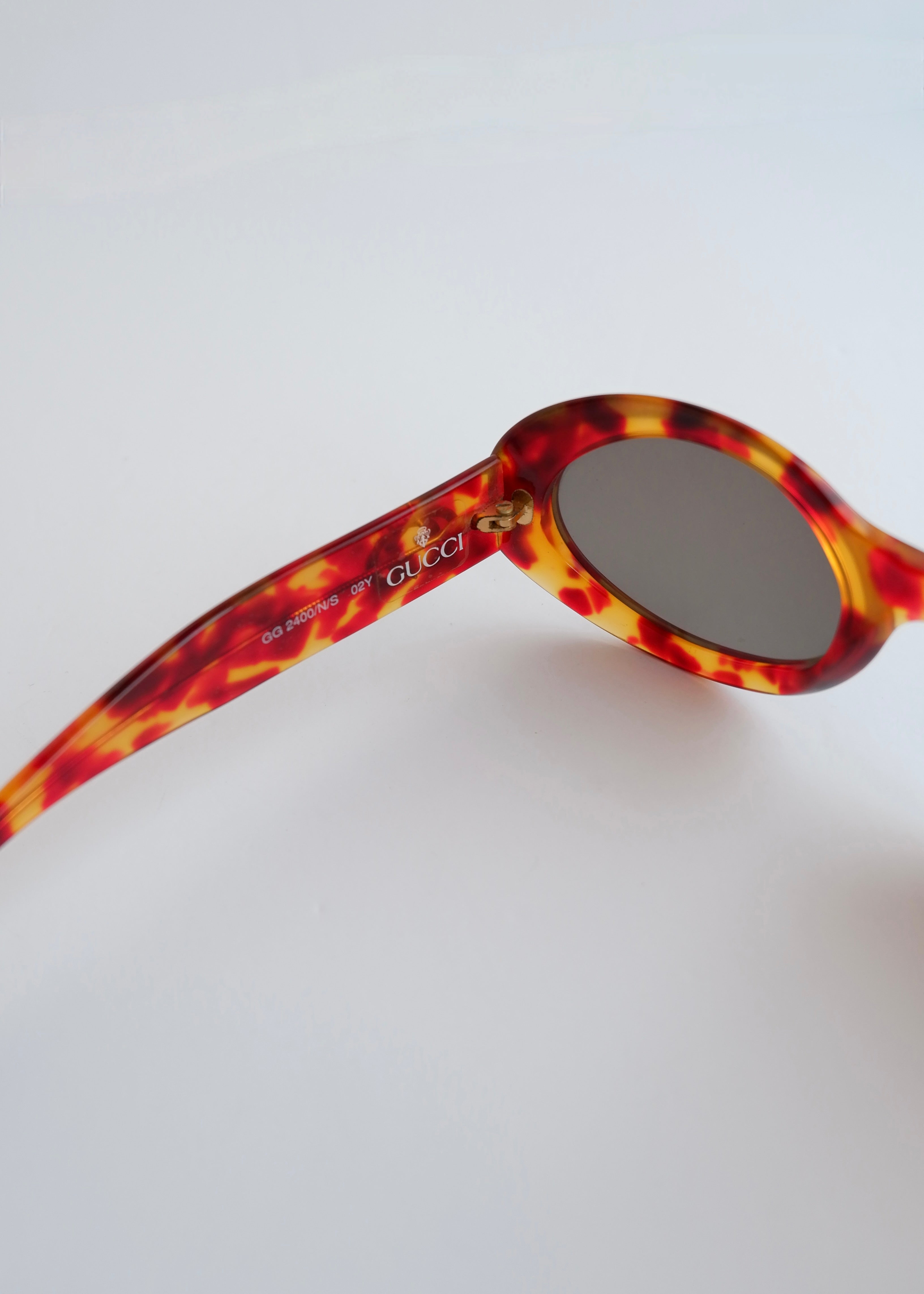 Authentiques lunettes de soleil vintage Gucci d'occasion à monture ronde écaille de tortue marron