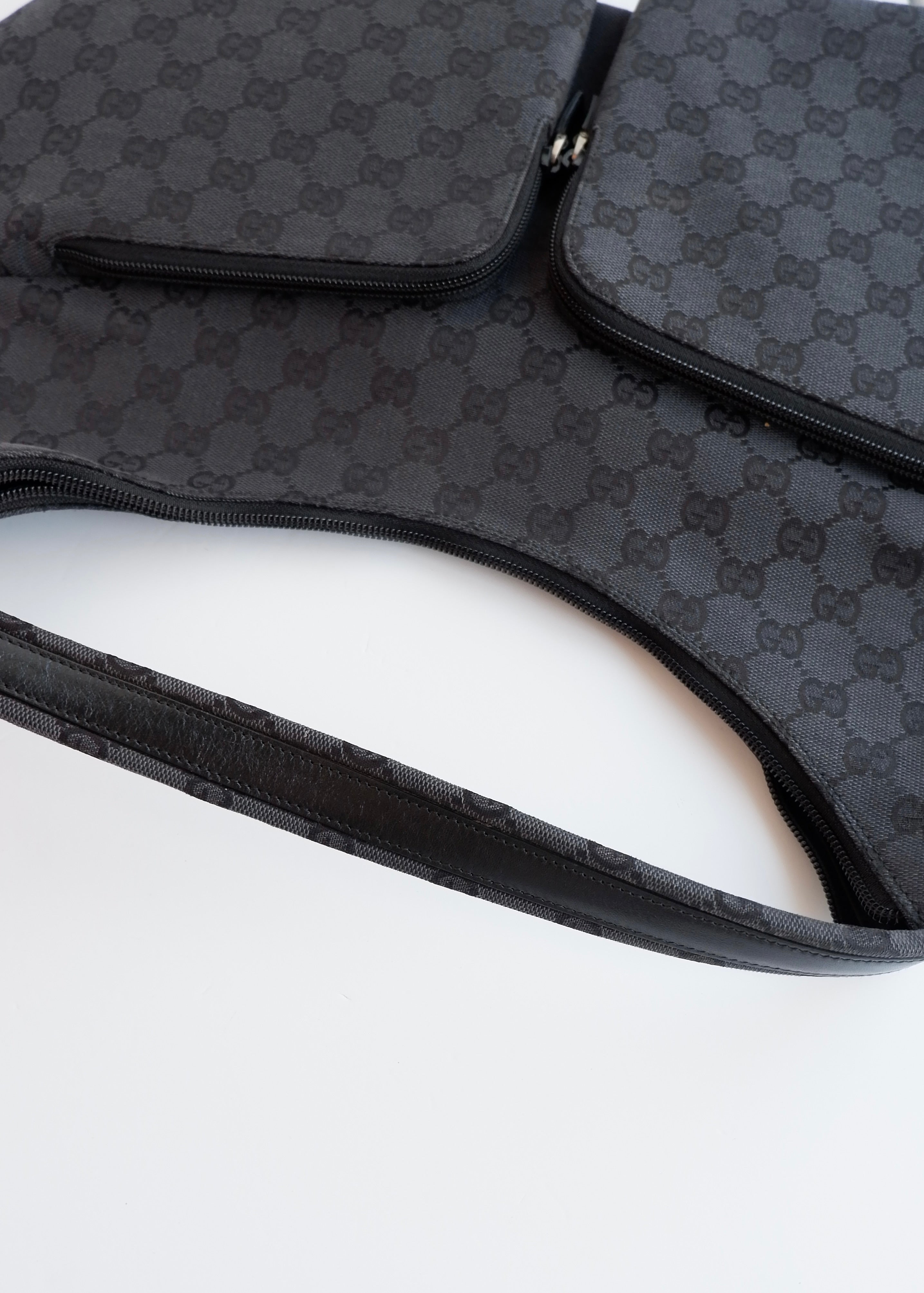 Authentique Sac à bandoulière Gucci en toile GG noire d'occasion