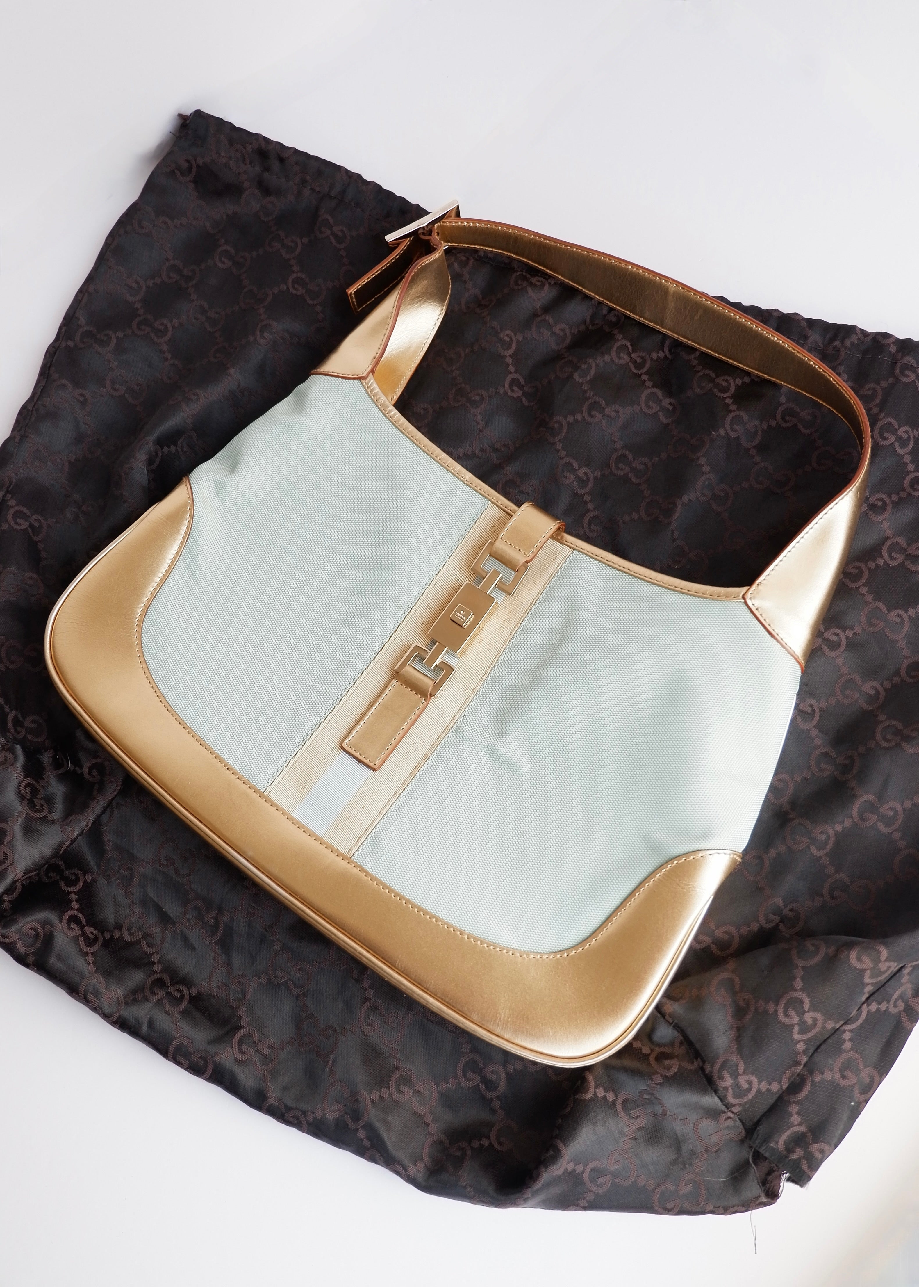 Authentique sac à bandoulière Gucci Jackie bleu/doré d'occasion