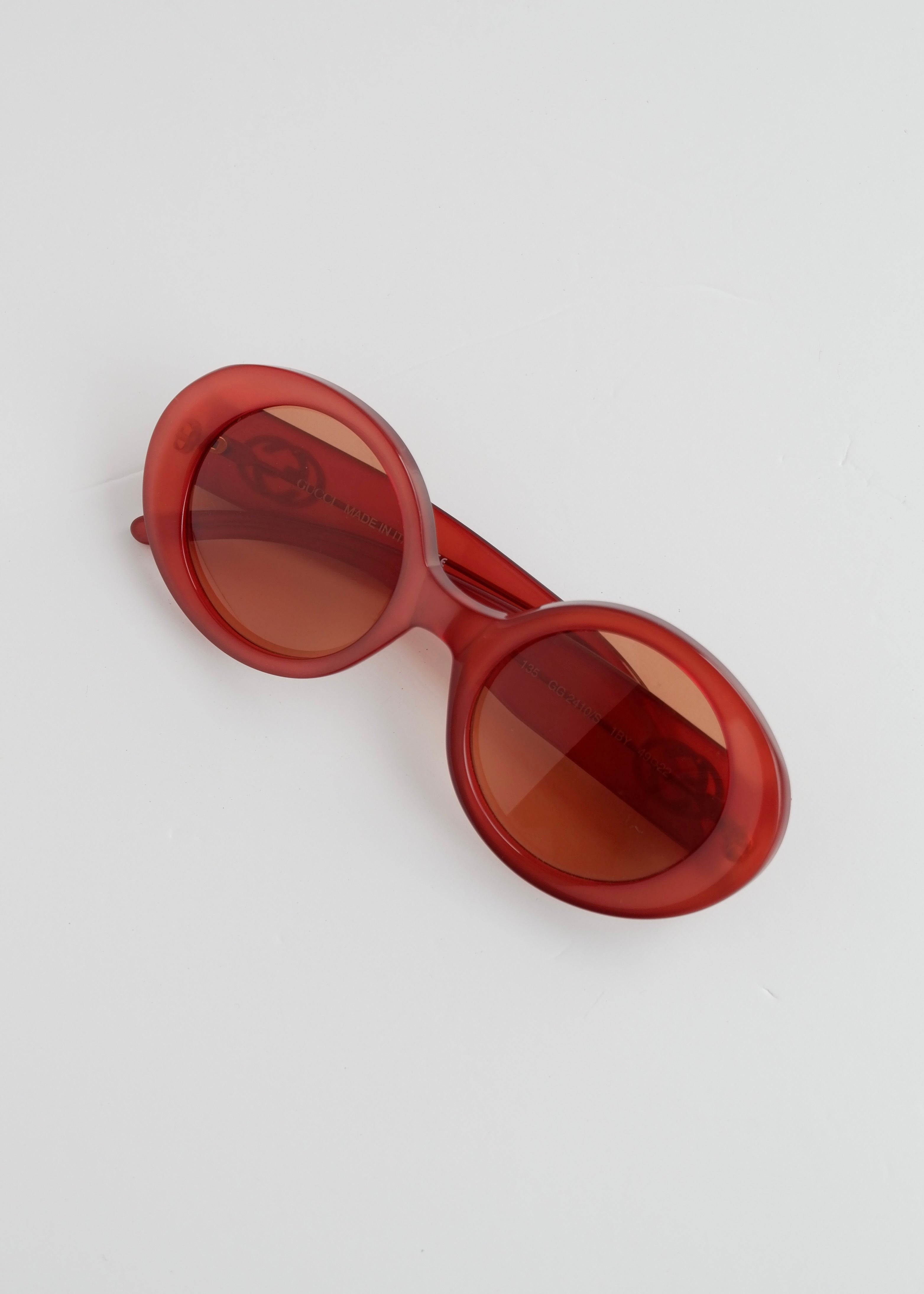 Authentiques lunettes de soleil Gucci rouges à monture ronde d'occasion