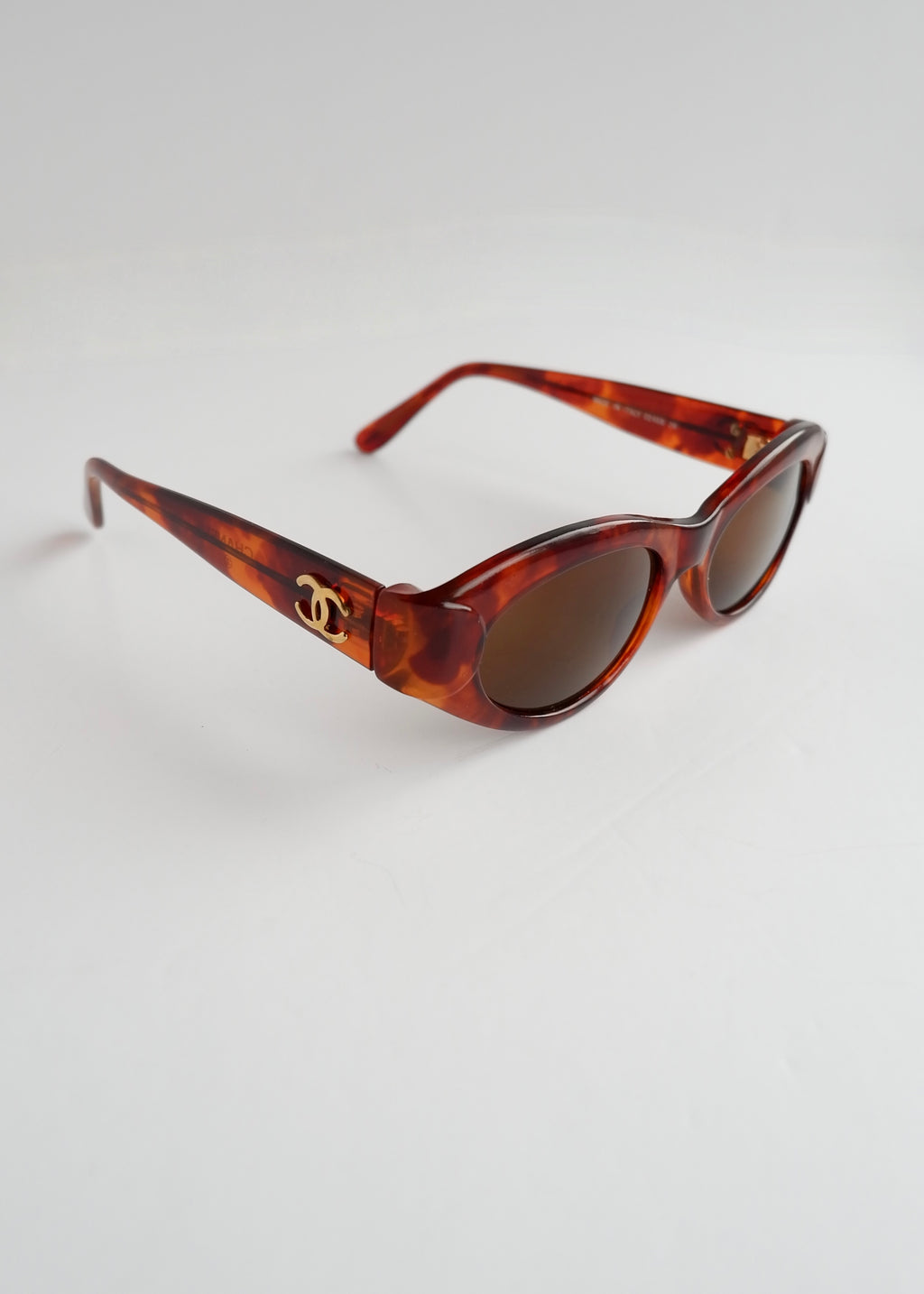 Authentiques lunettes de soleil Chanel d'occasion marron écaille de tortue