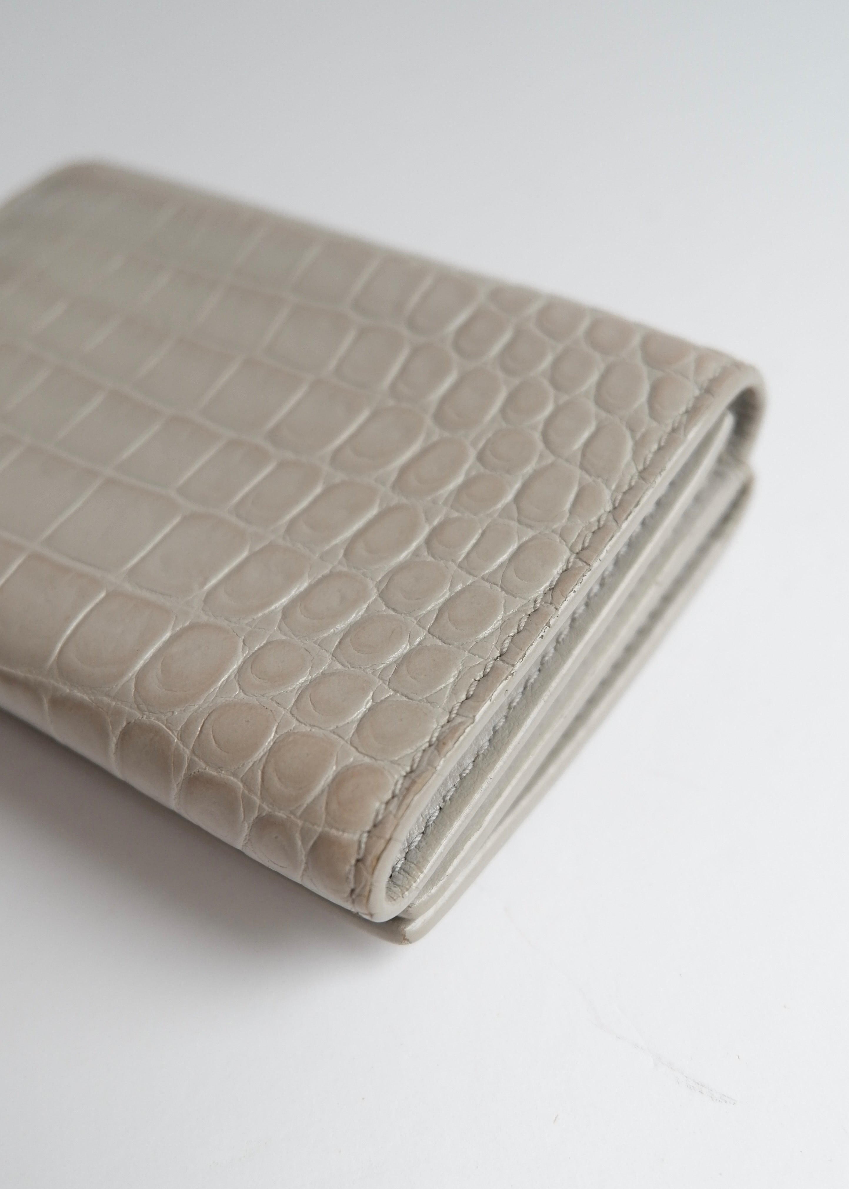 Preowned Saint Laurent Grey Leather Embossed Compact Wallet