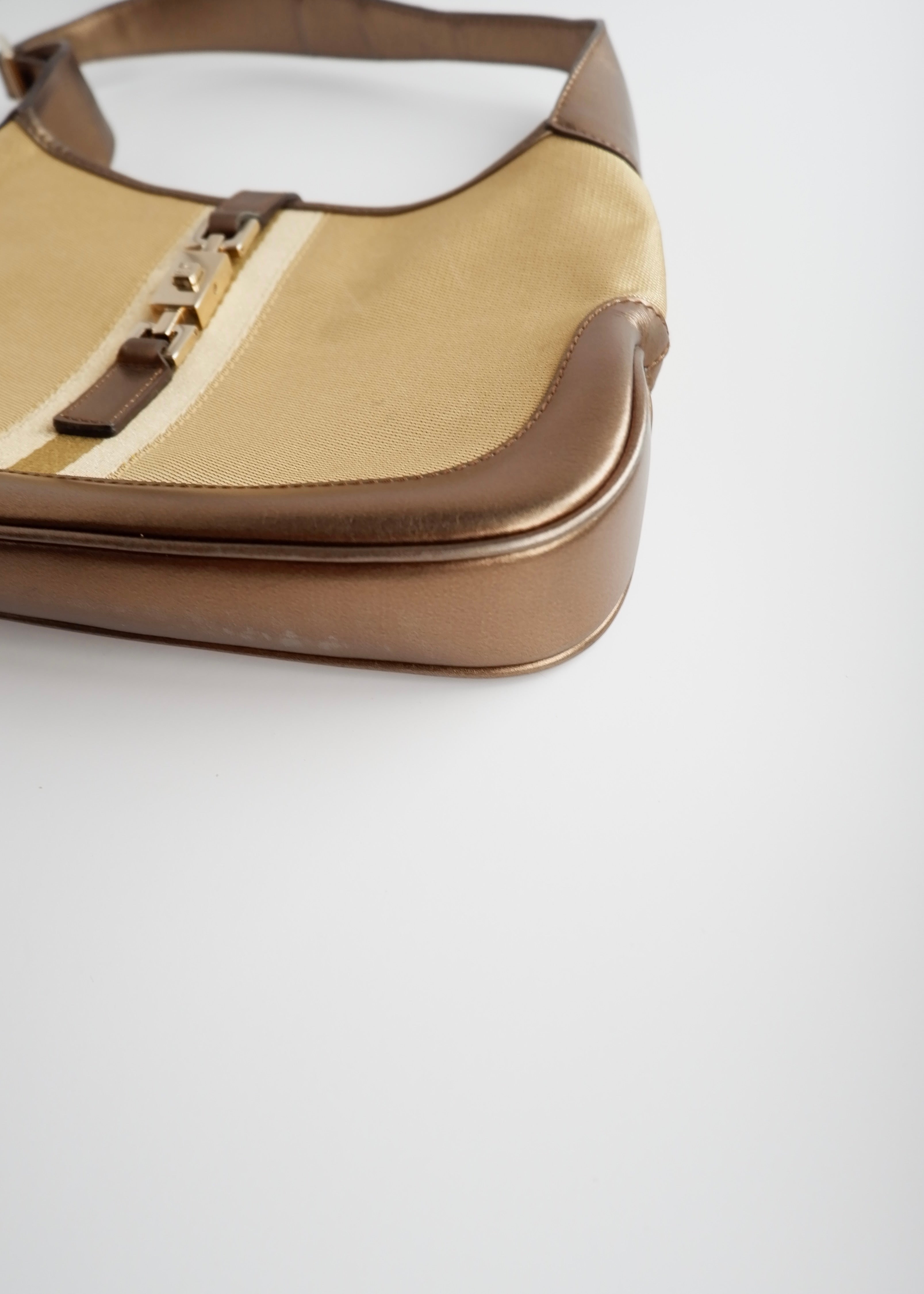 Authentique Sac Jackie Gucci d'occasion en Toile et Cuir Doré/Beige