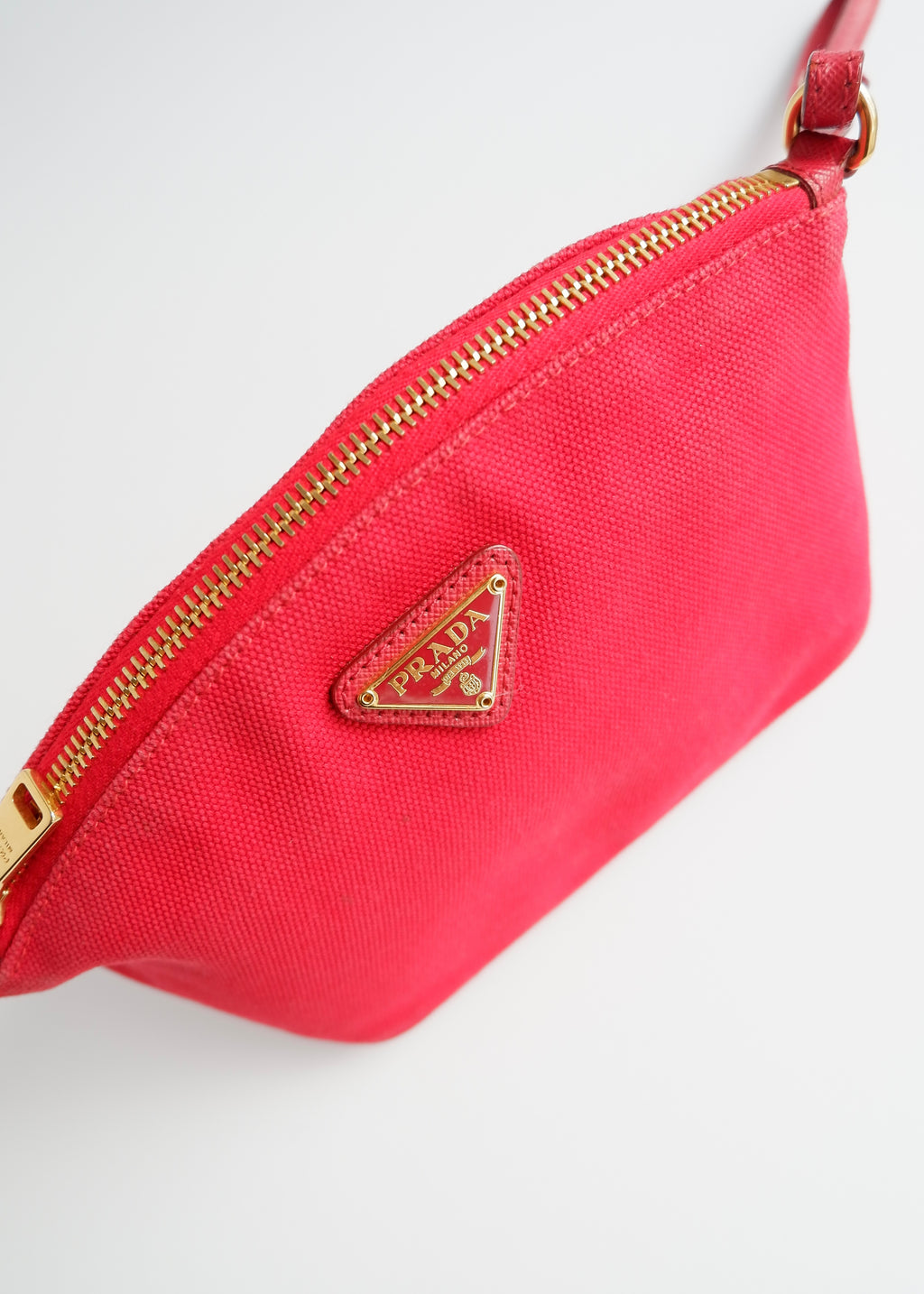 Pochette Prada en toile rouge authentique d'occasion