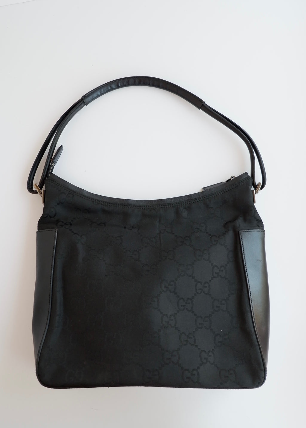 Sac bandoulière Gucci authentique d'occasion en toile/cuir noir imprimé GG