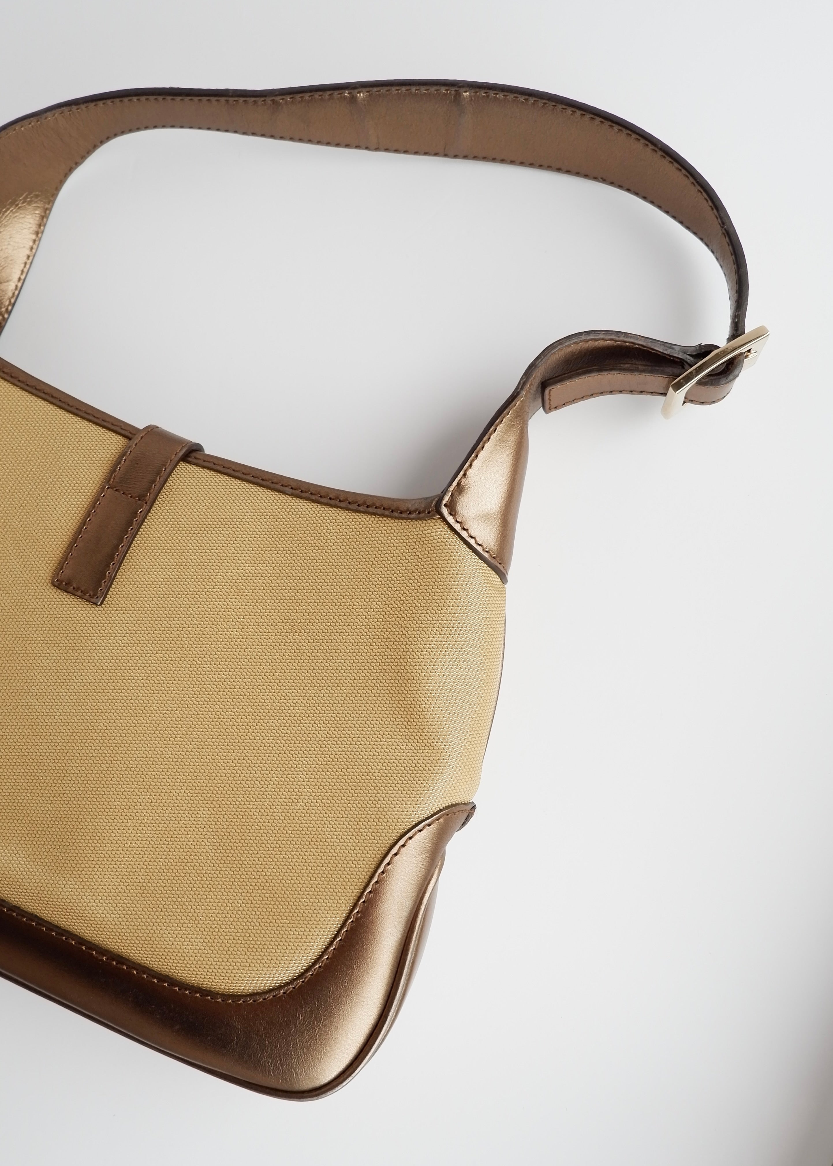 Authentique Sac Jackie Gucci d'occasion en Toile et Cuir Doré/Beige