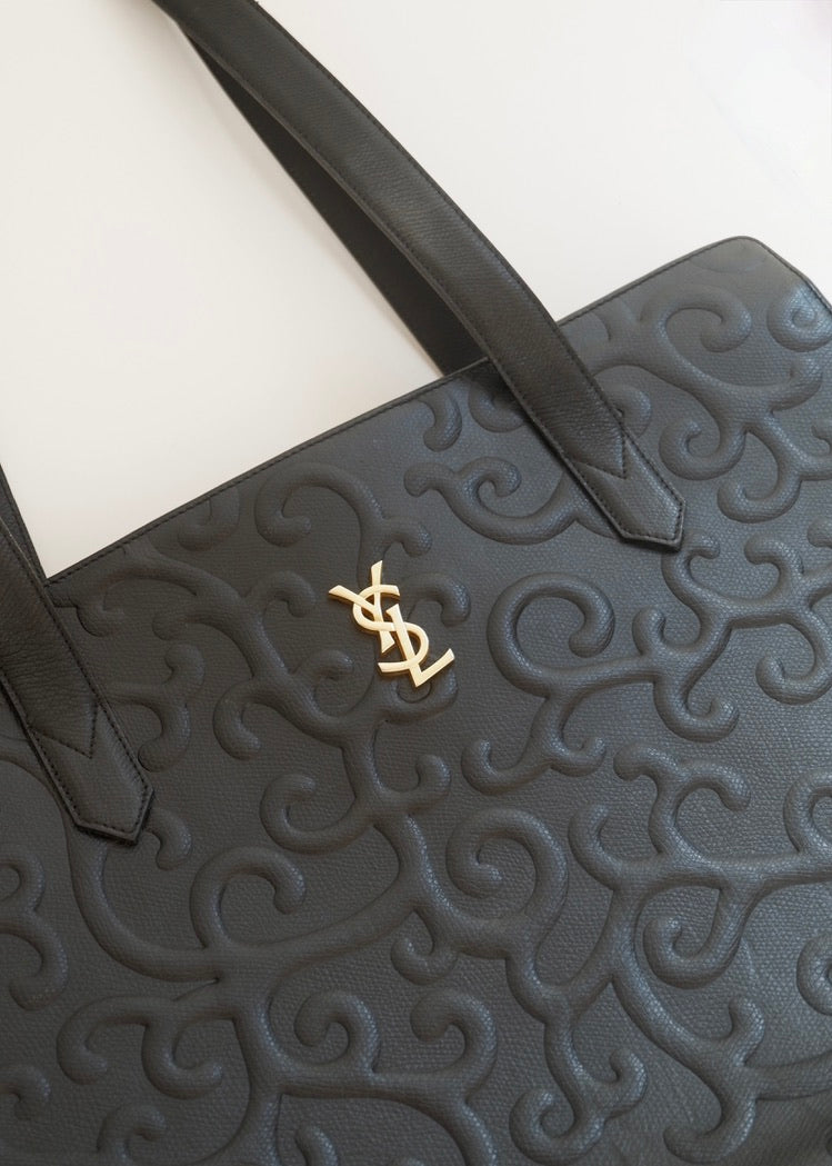 Preowned Vintage YSL Black Leather Embossed Printed Tote Bag