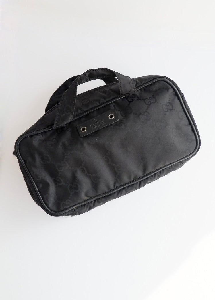 Pochette vanity Gucci en nylon GG noir d'occasion authentique
