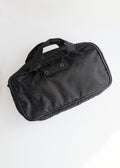 Pochette vanity Gucci en nylon GG noir d'occasion authentique