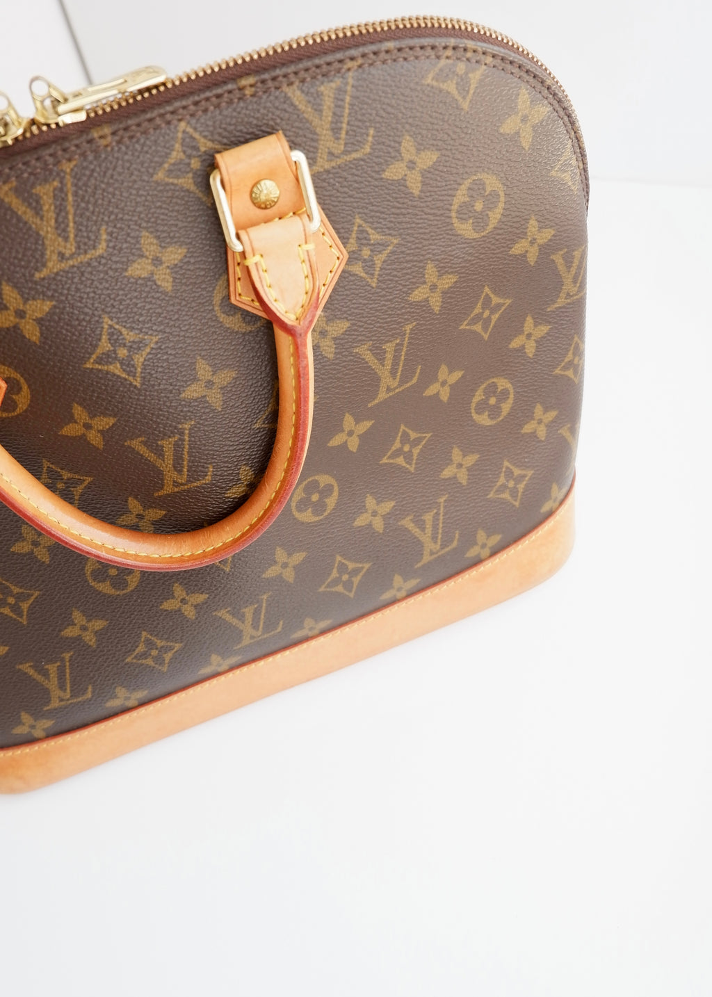 Sac à main Louis Vuitton Alma Monogram d'occasion authentique