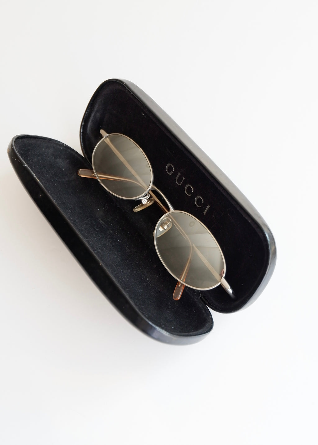 Authentiques lunettes de soleil Gucci d'occasion en argent/transparent à monture ronde