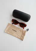 Authentiques lunettes de soleil Chanel d'occasion marron écaille de tortue