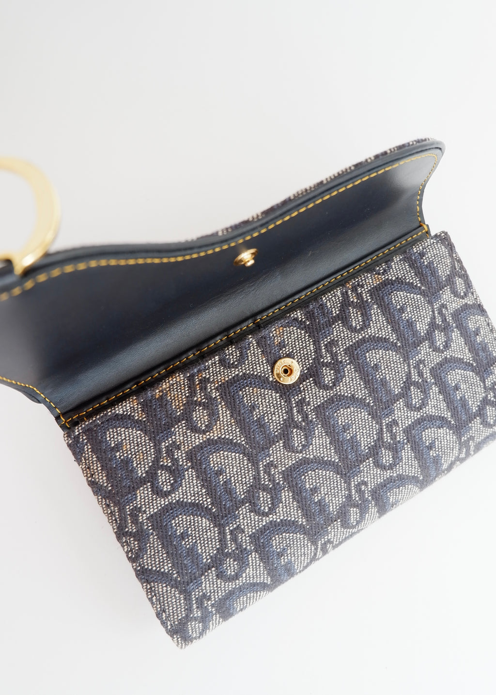 Portefeuille Dior authentique d'occasion en toile trotteur bleu marine