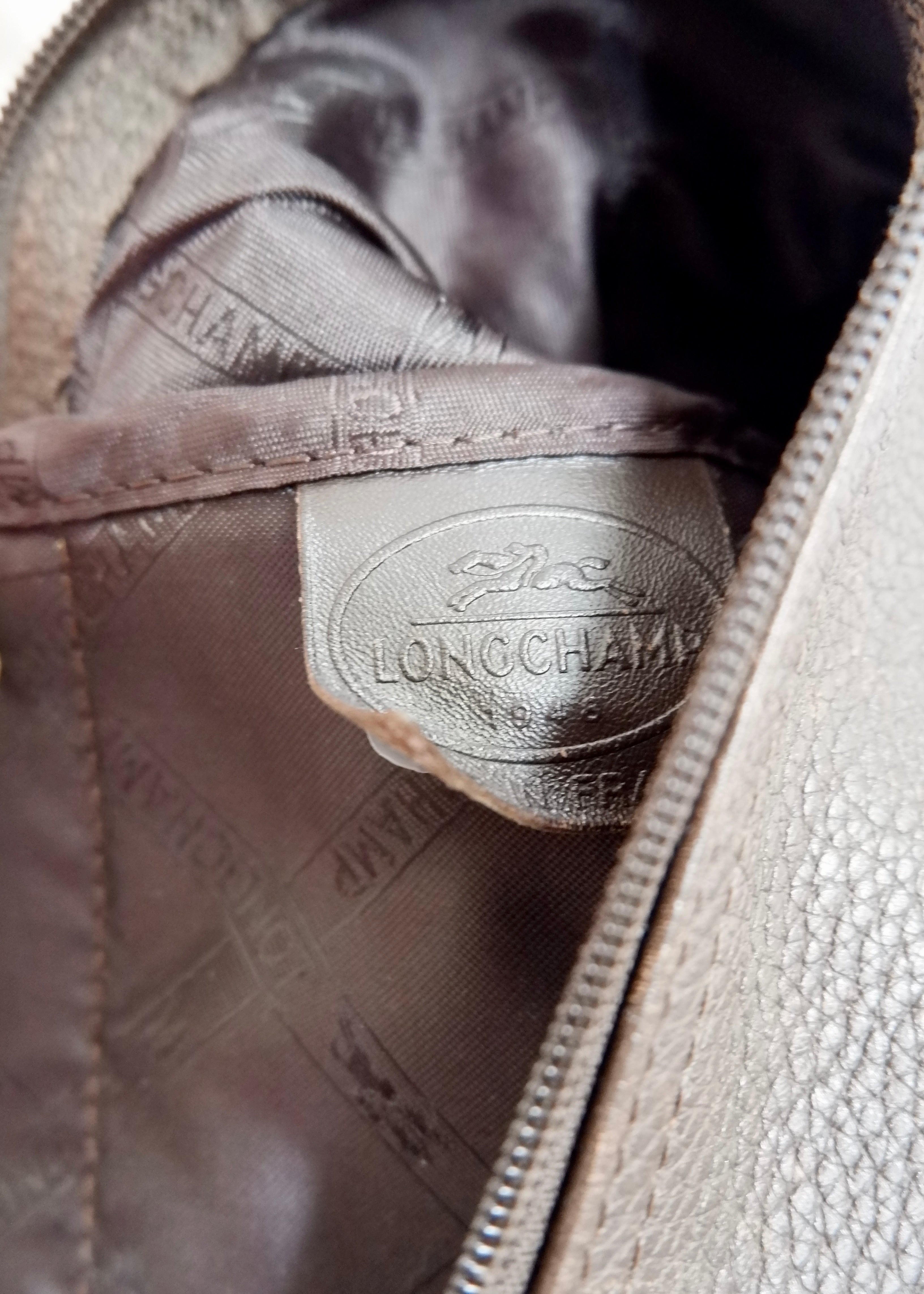 Authentique sac à dos en cuir marron Longchamp d'occasion