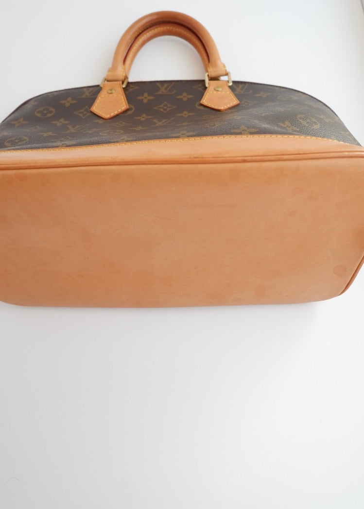 Sac à main Louis Vuitton Alma Monogram d'occasion authentique