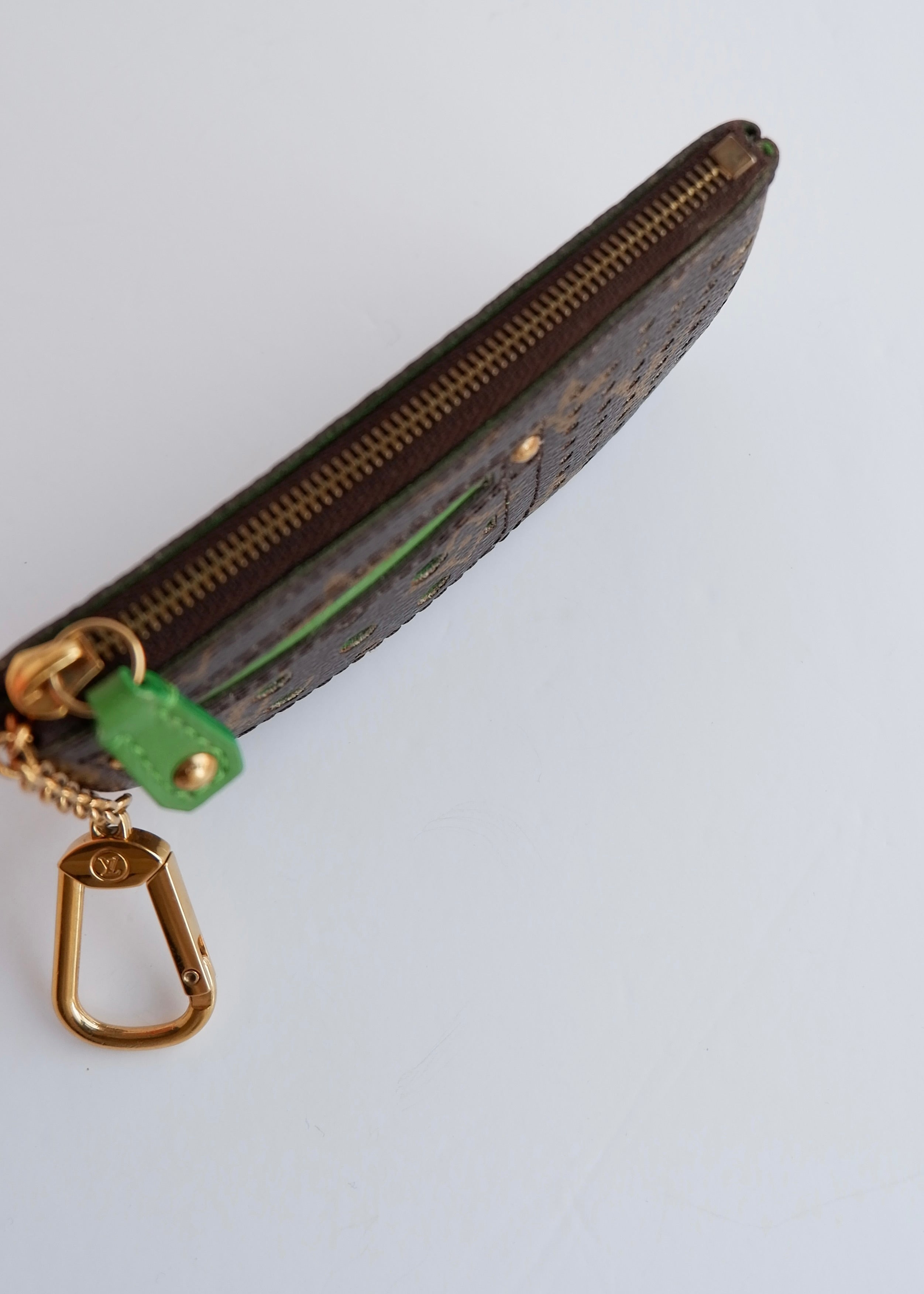 Authentic Preowned Louis Vuitton Limited Edition Monogram Green Perforated Pochette Cle