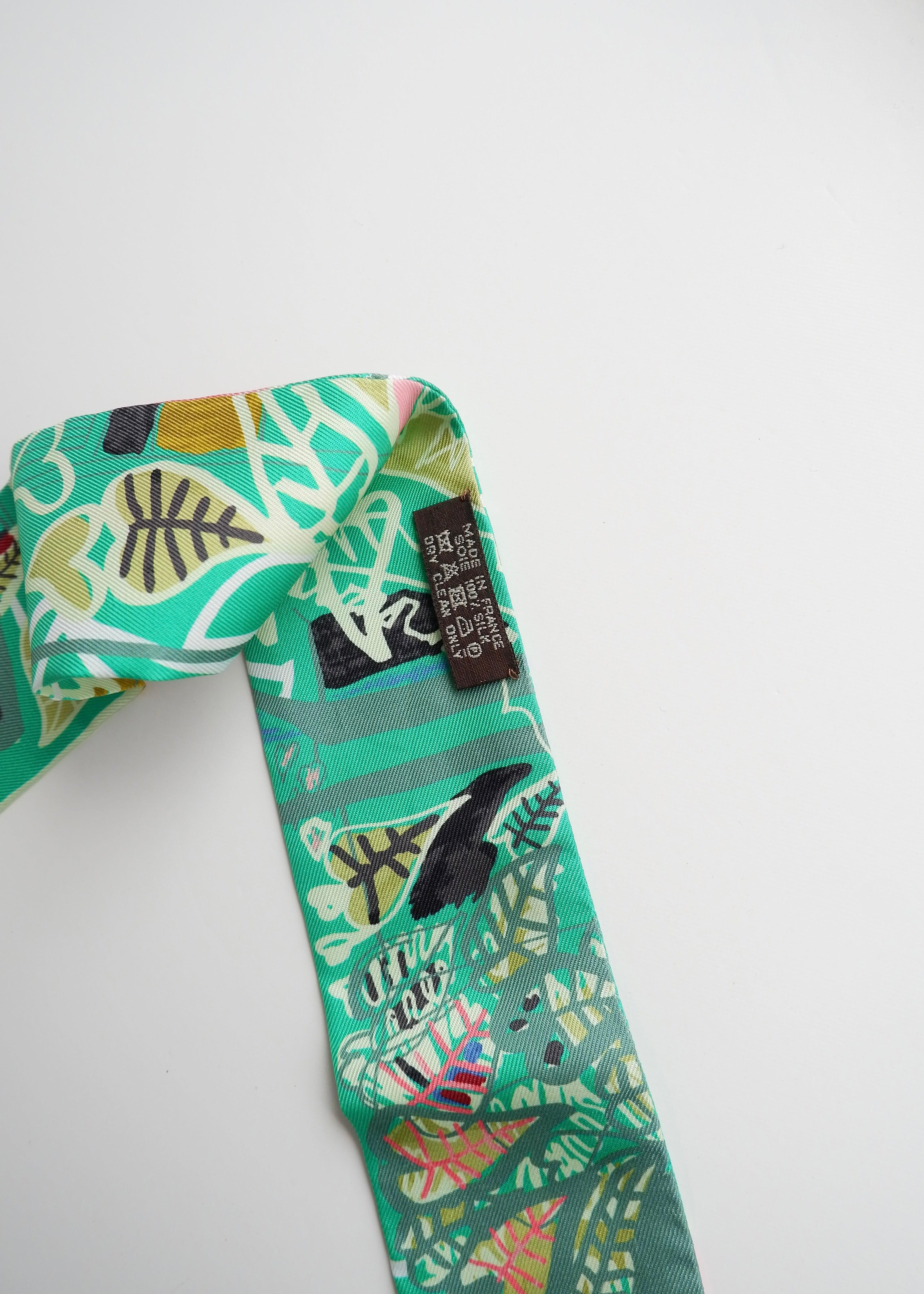 Authentic Preowned Hermes Green Mixed Print Twilly