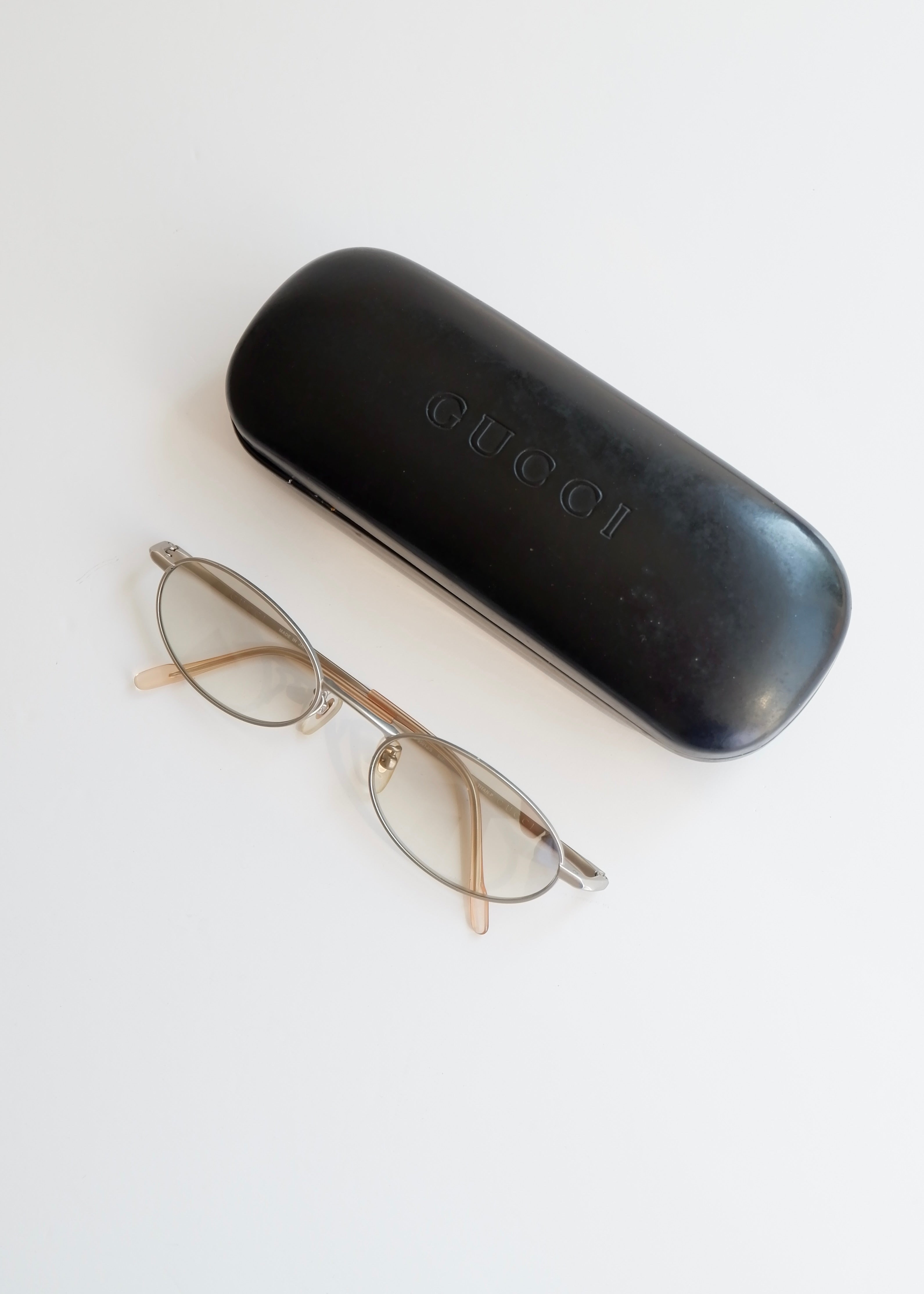 Authentiques lunettes de soleil Gucci d'occasion en argent/transparent à monture ronde