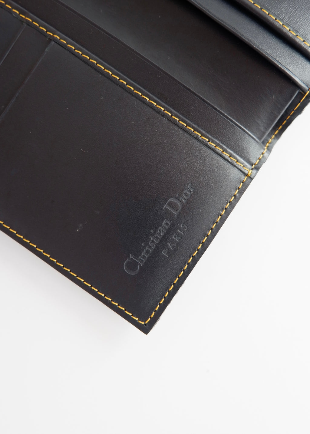 Portefeuille Dior authentique d'occasion en toile trotteur bleu marine