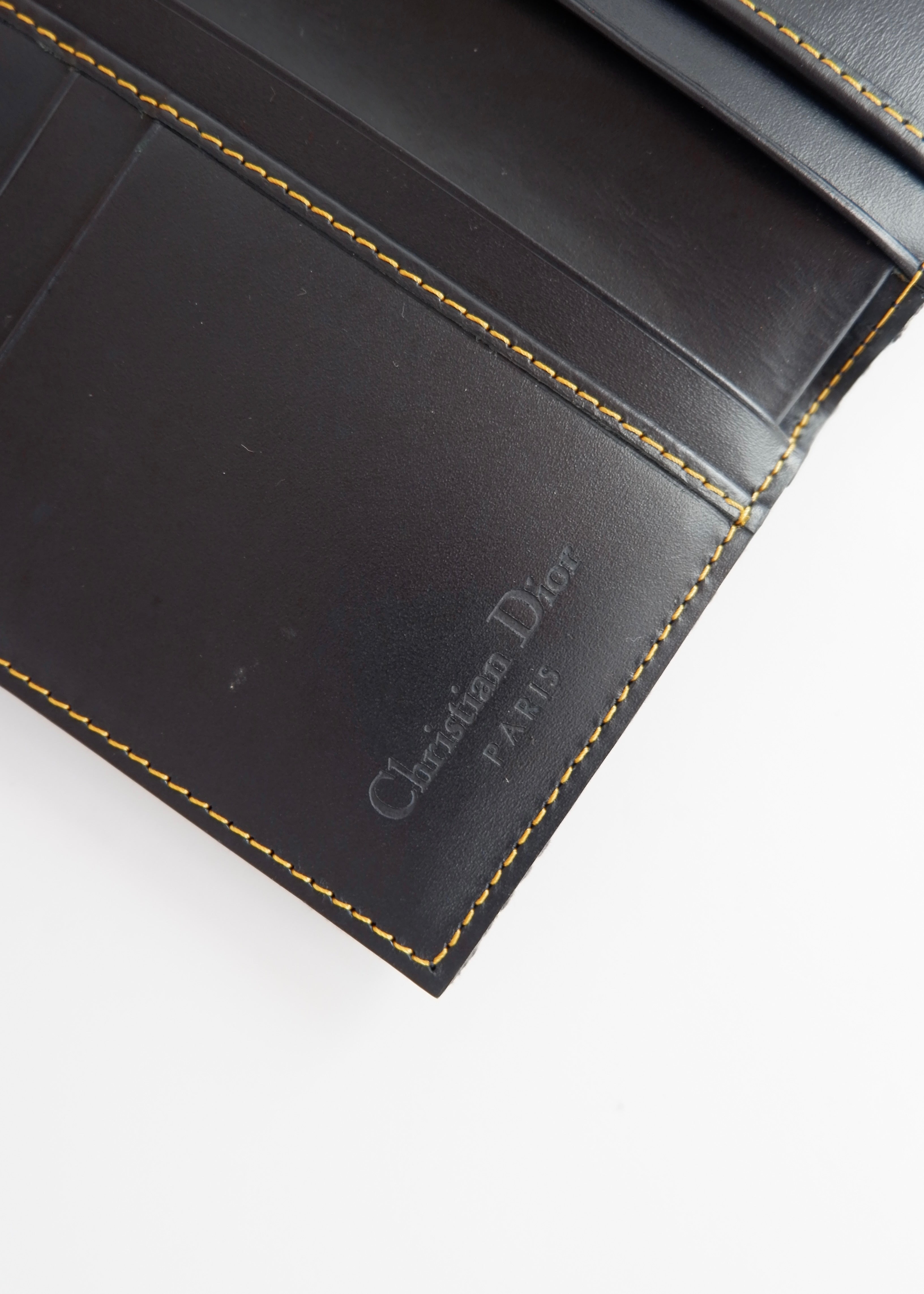 Portefeuille Dior authentique d'occasion en toile trotteur bleu marine