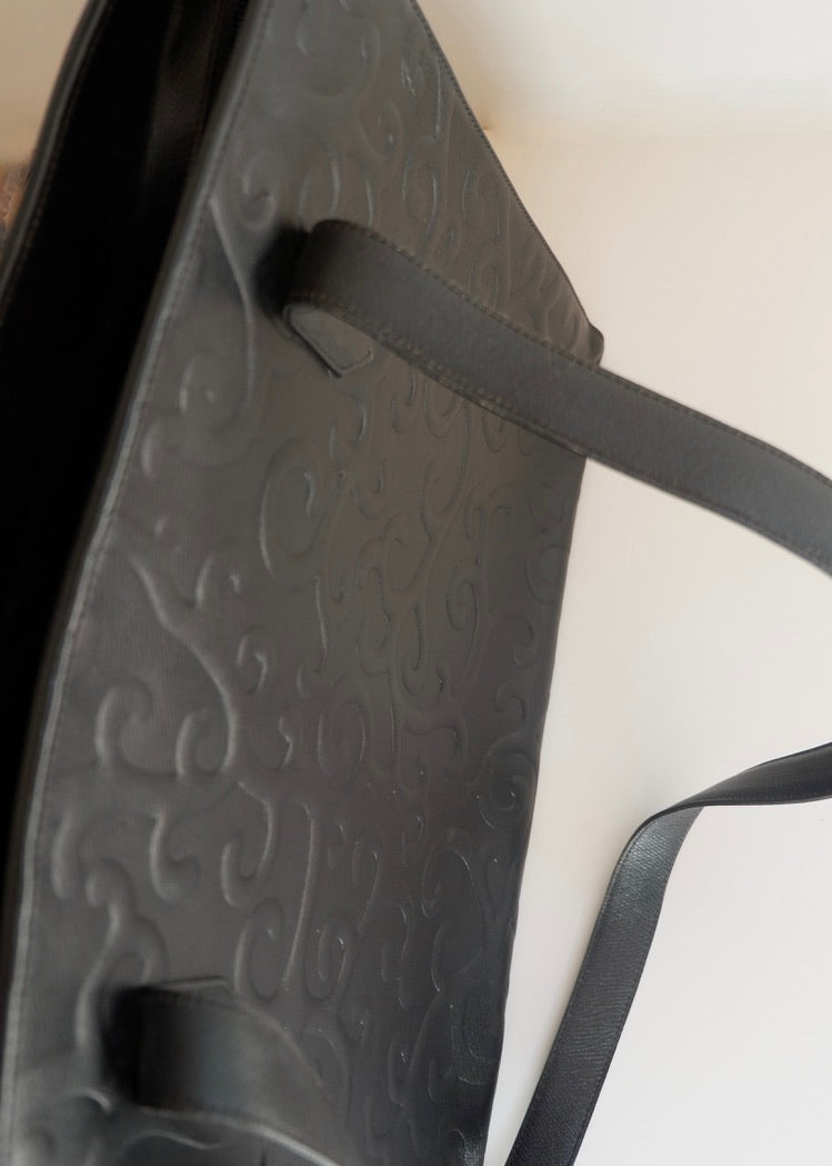 Preowned Vintage YSL Black Leather Embossed Printed Tote Bag