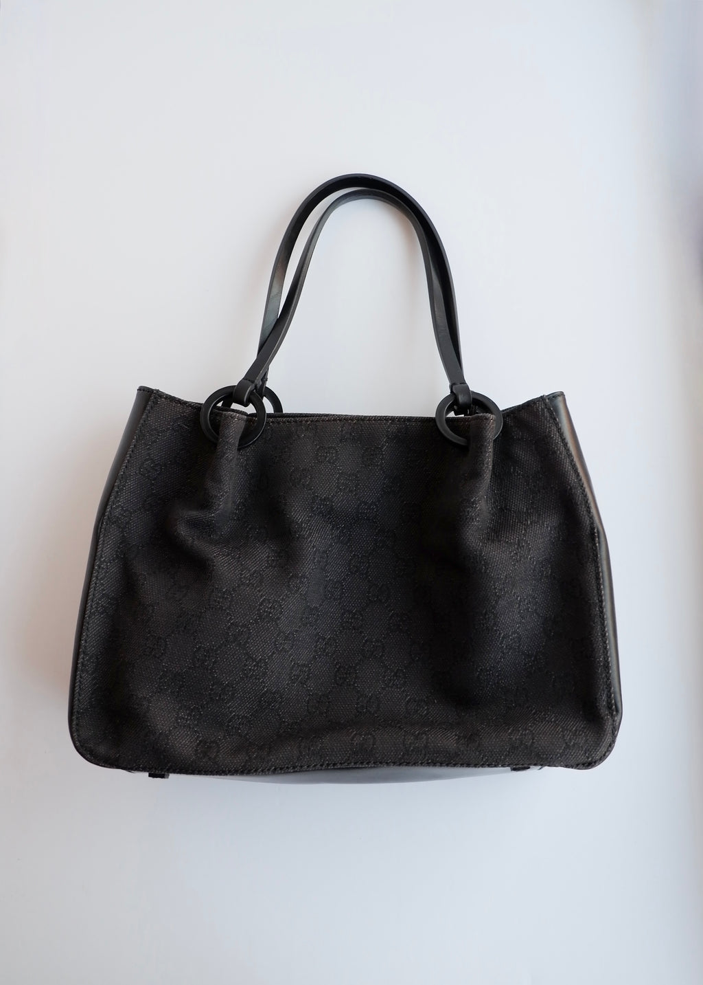 Authentique sac bandoulière Gucci d'occasion en toile GG en jean/cuir noir