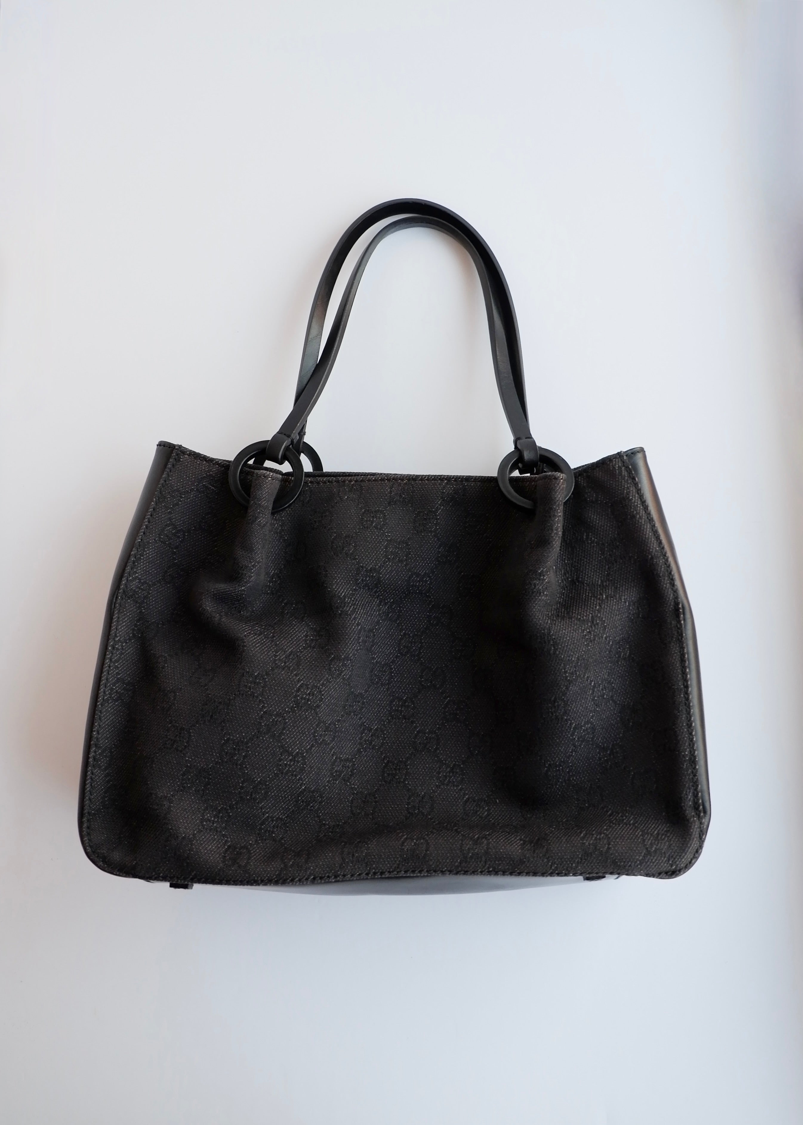 Authentique sac bandoulière Gucci d'occasion en toile GG en jean/cuir noir
