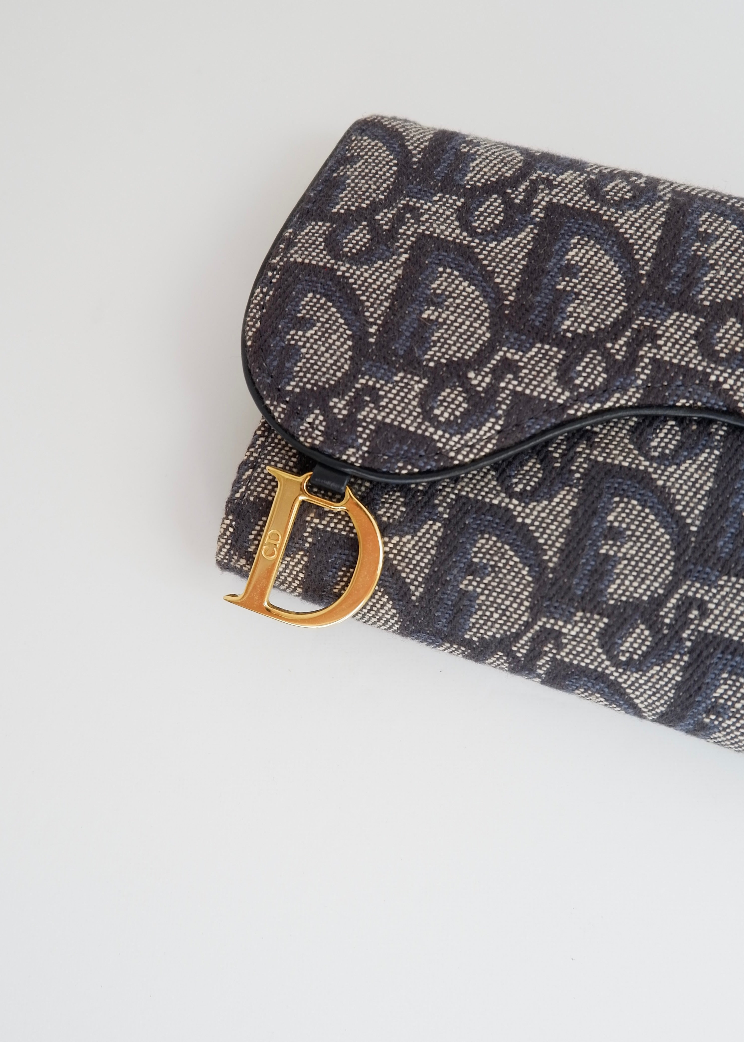 Portefeuille Dior authentique d'occasion en toile trotteur bleu marine