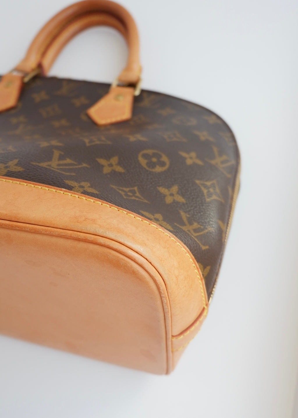 Sac à main Louis Vuitton Alma Monogram d'occasion authentique