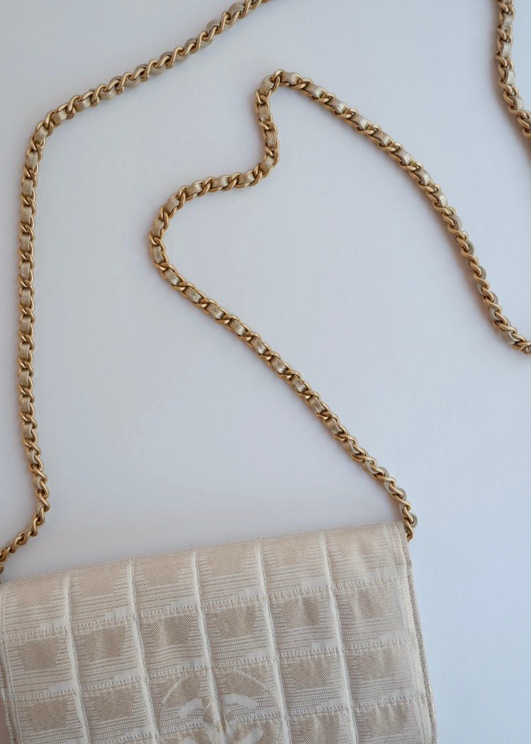 Authentic Preowned Chanel Gold Canvas New Travel Line WOC Bag