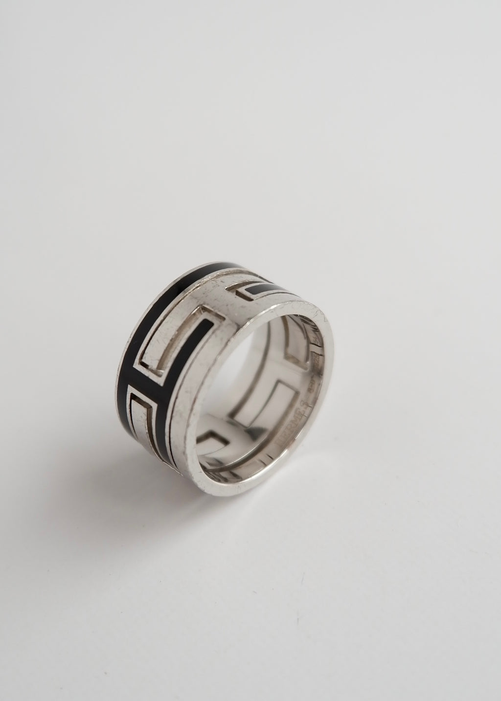 Authentique bague Hermes d'occasion Move H Noire/Argentée