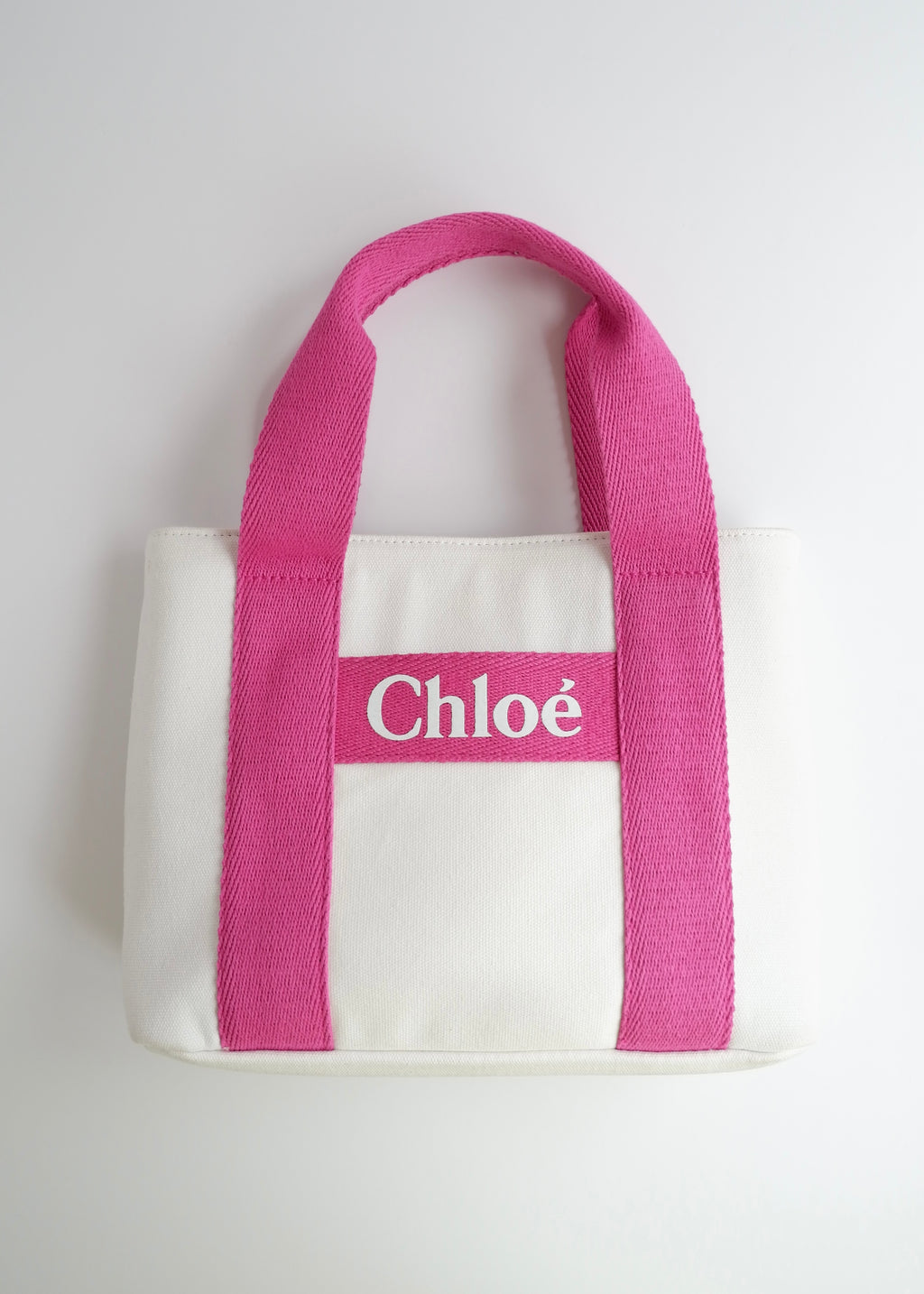 Sac Chloe bandoulière ou à main en toile blanc/rose authentique d'occasion