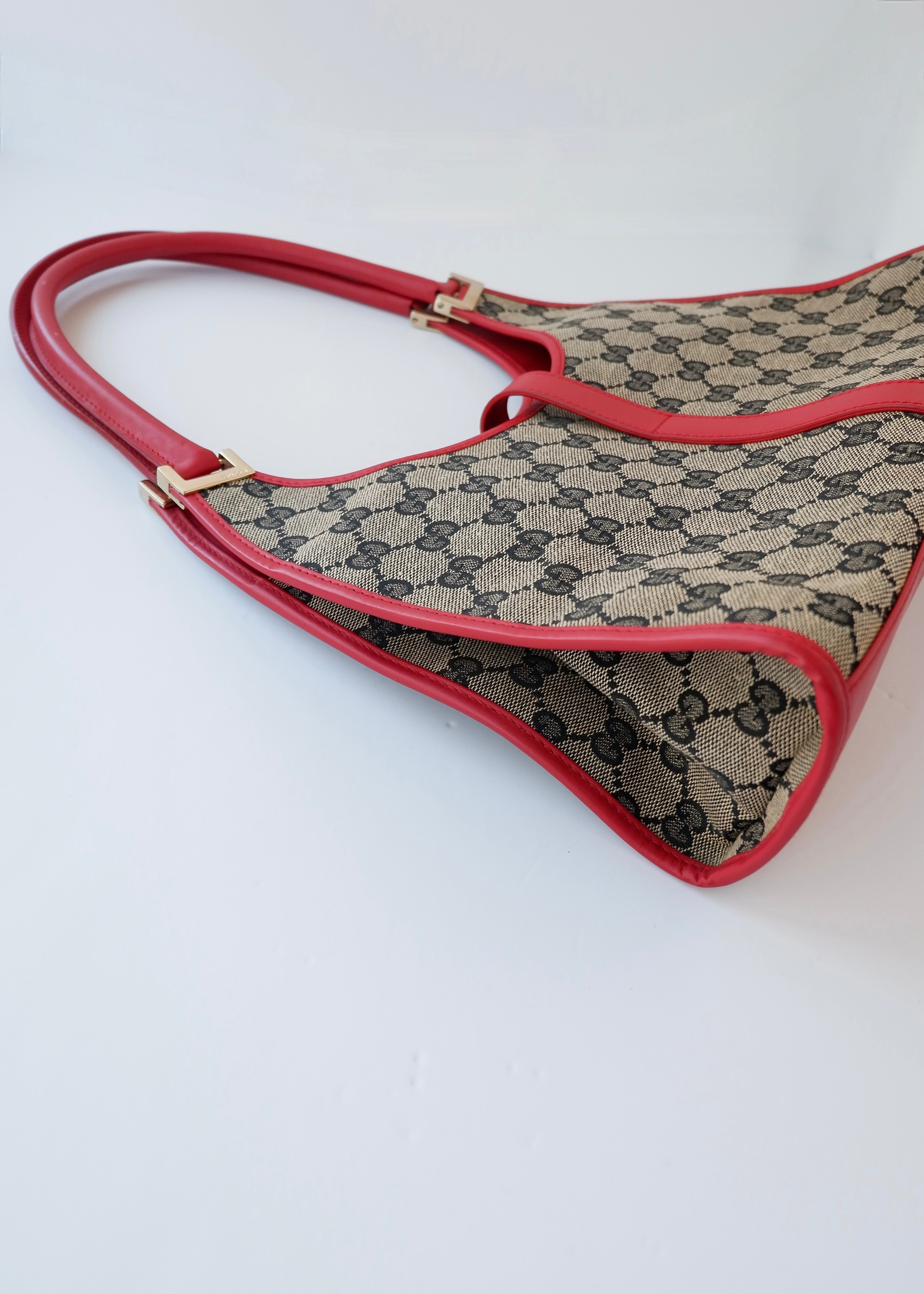 Preowned Gucci Red GG Canvas Jackie Piston Closure Shoulder Bag