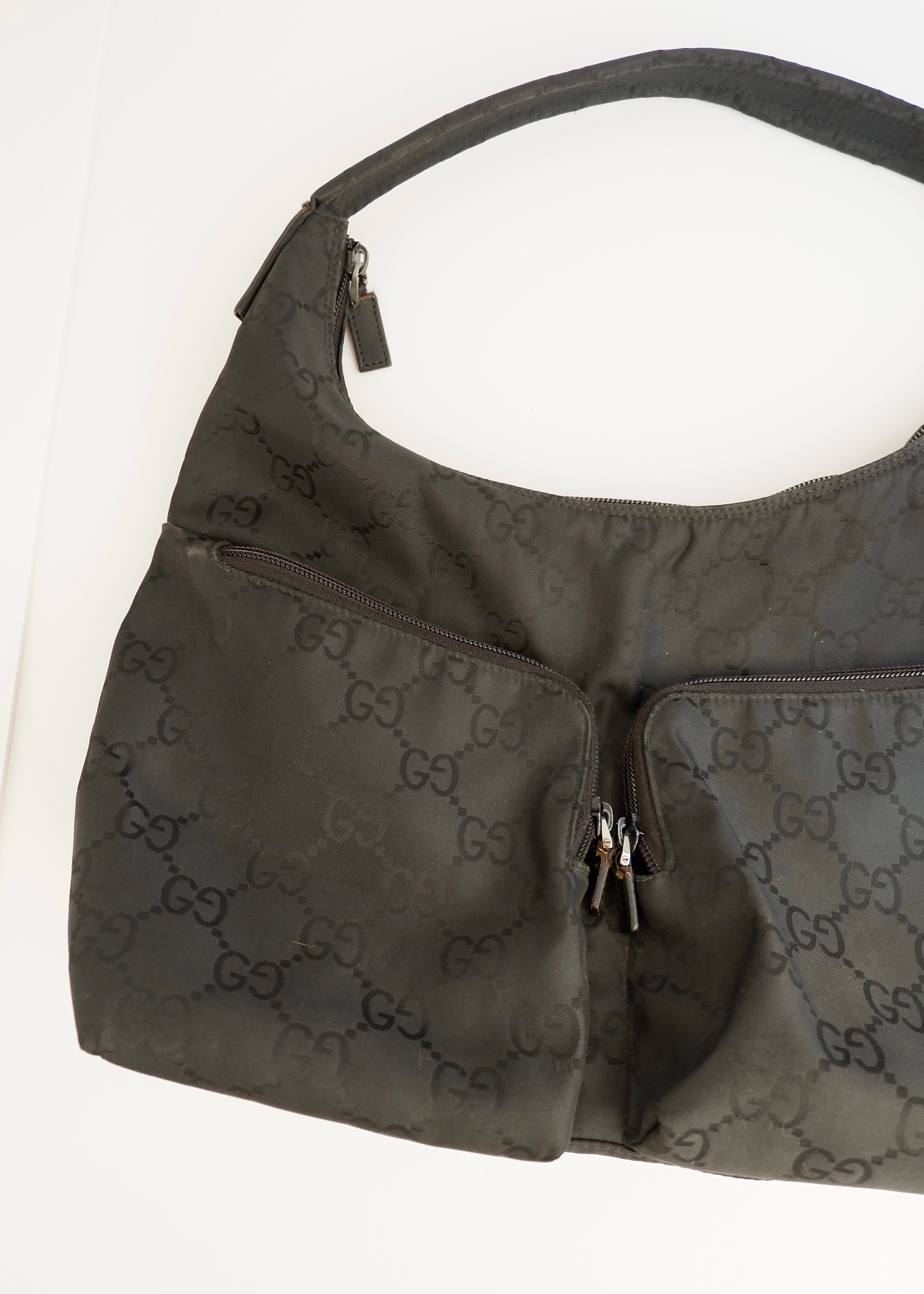 Authentique Sac à bandoulière Gucci en toile GG noire d'occasion