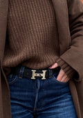 Authentique ceinture Hermes Constance H réversible en cuir noir/marron d'occasion SHW