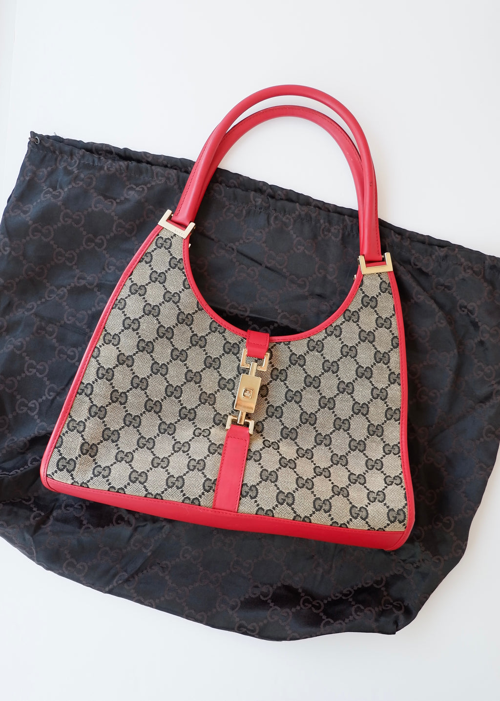 Preowned Gucci Red GG Canvas Jackie Piston Closure Shoulder Bag