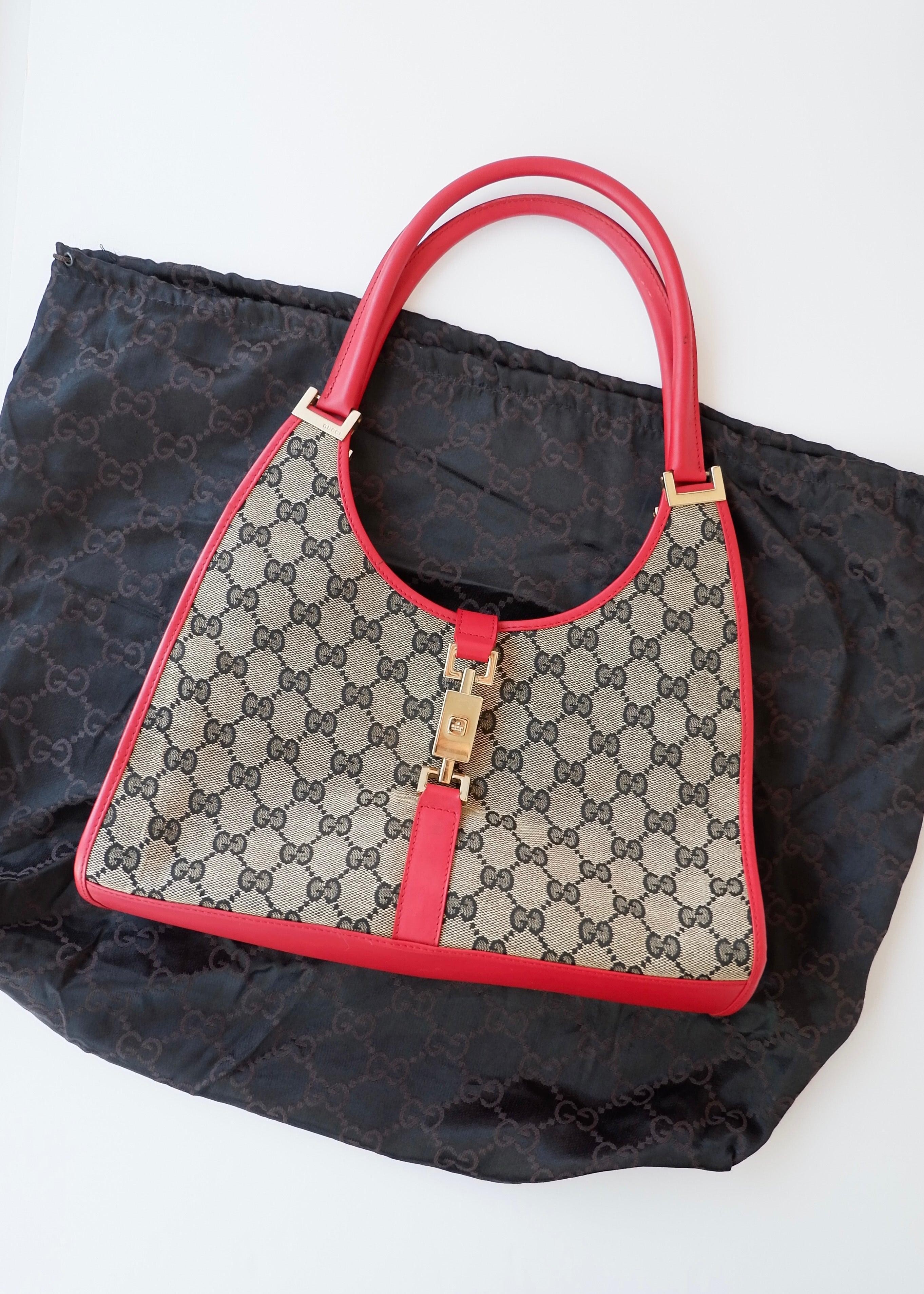 Preowned Gucci Red GG Canvas Jackie Piston Closure Shoulder Bag