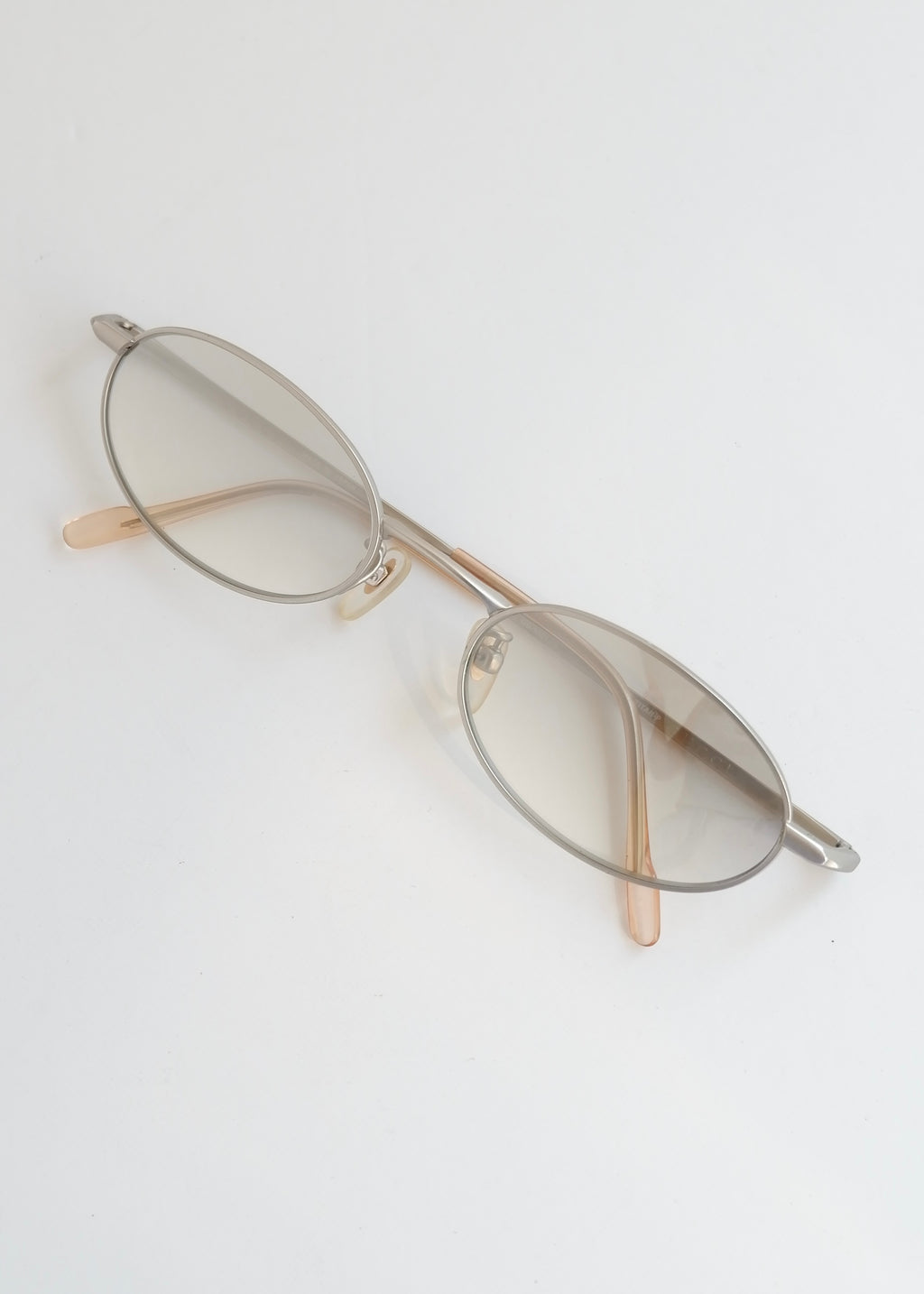 Authentiques lunettes de soleil Gucci d'occasion en argent/transparent à monture ronde