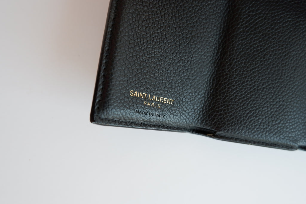 Authentique portefeuille bifold YSL en cuir gris foncé d'occasion