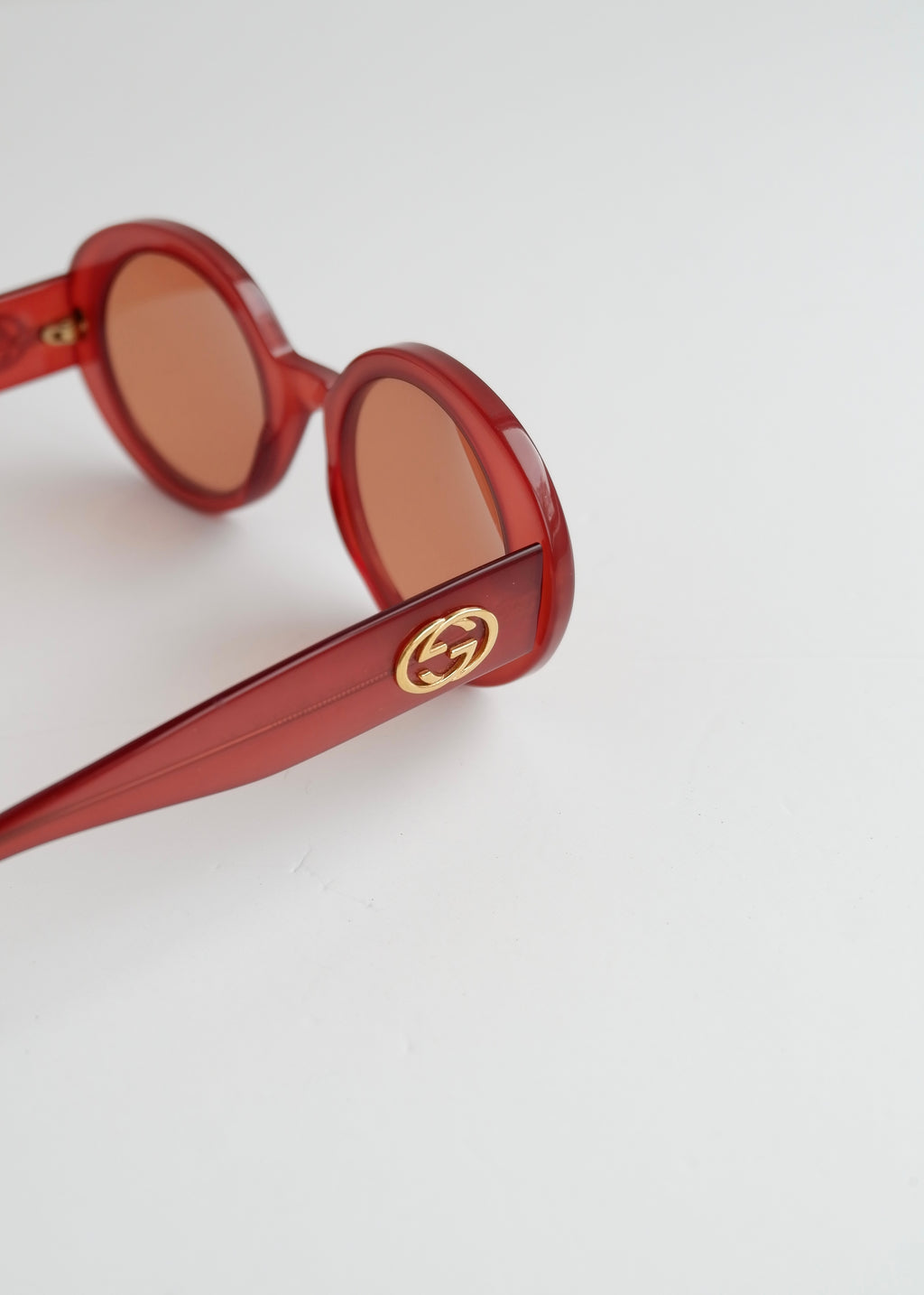 Authentiques lunettes de soleil Gucci rouges à monture ronde d'occasion