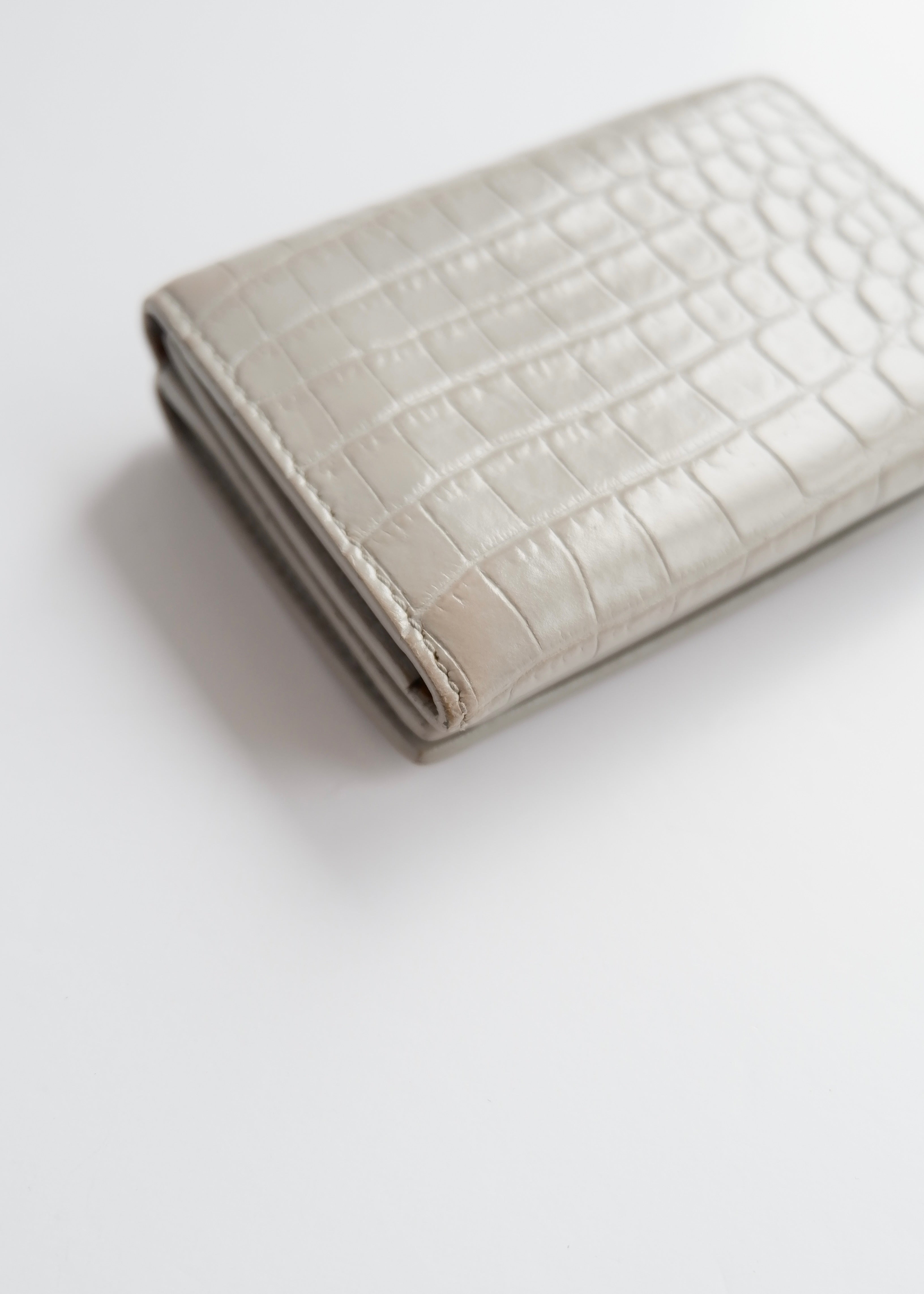 Preowned Saint Laurent Grey Leather Embossed Compact Wallet