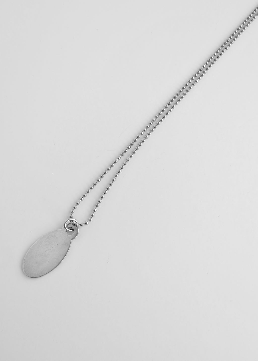 Authentique collier long chaîne avec pendentif plaque militaire Tiffany & Co. en argent d'occasion