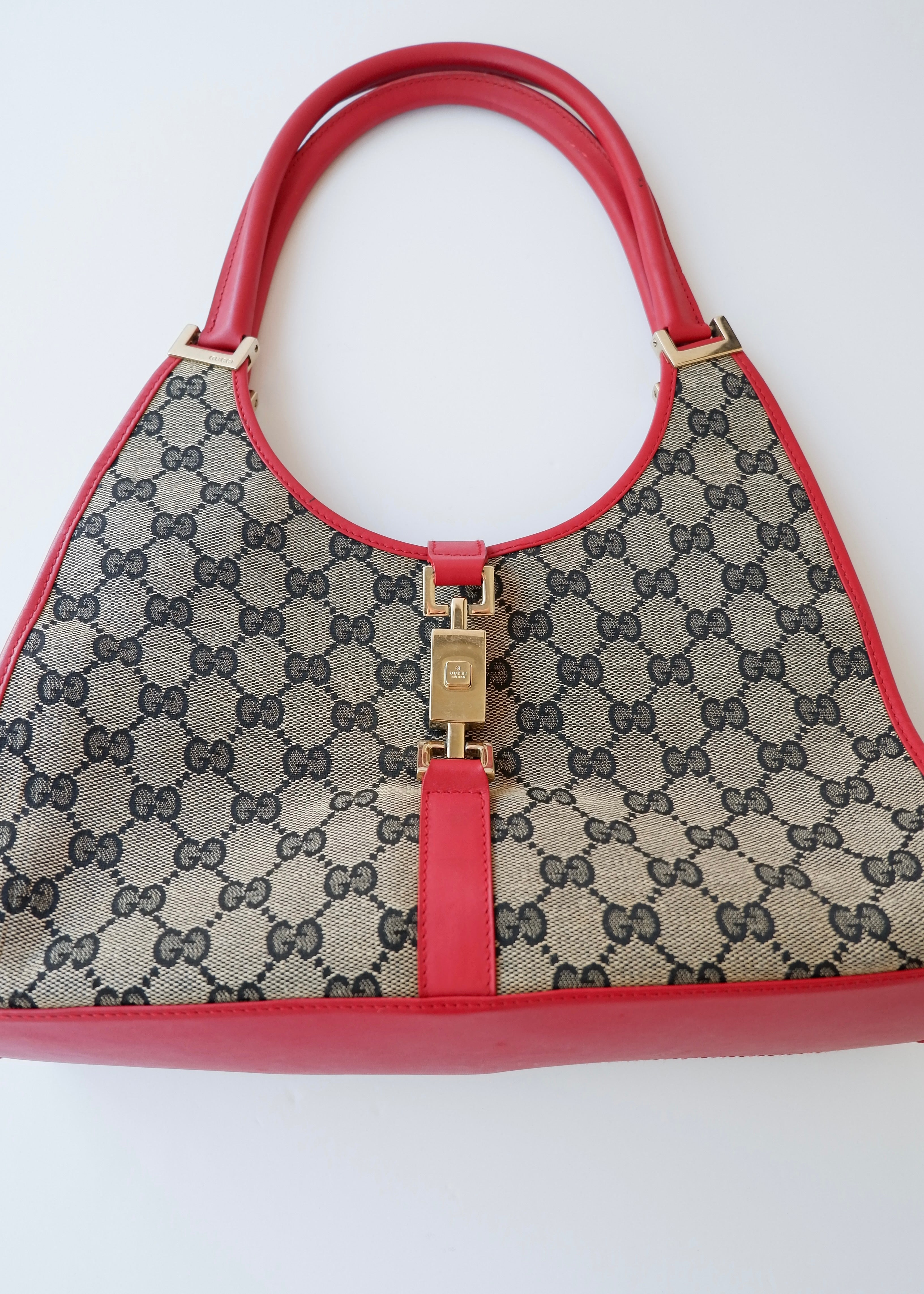 Preowned Gucci Red GG Canvas Jackie Piston Closure Shoulder Bag