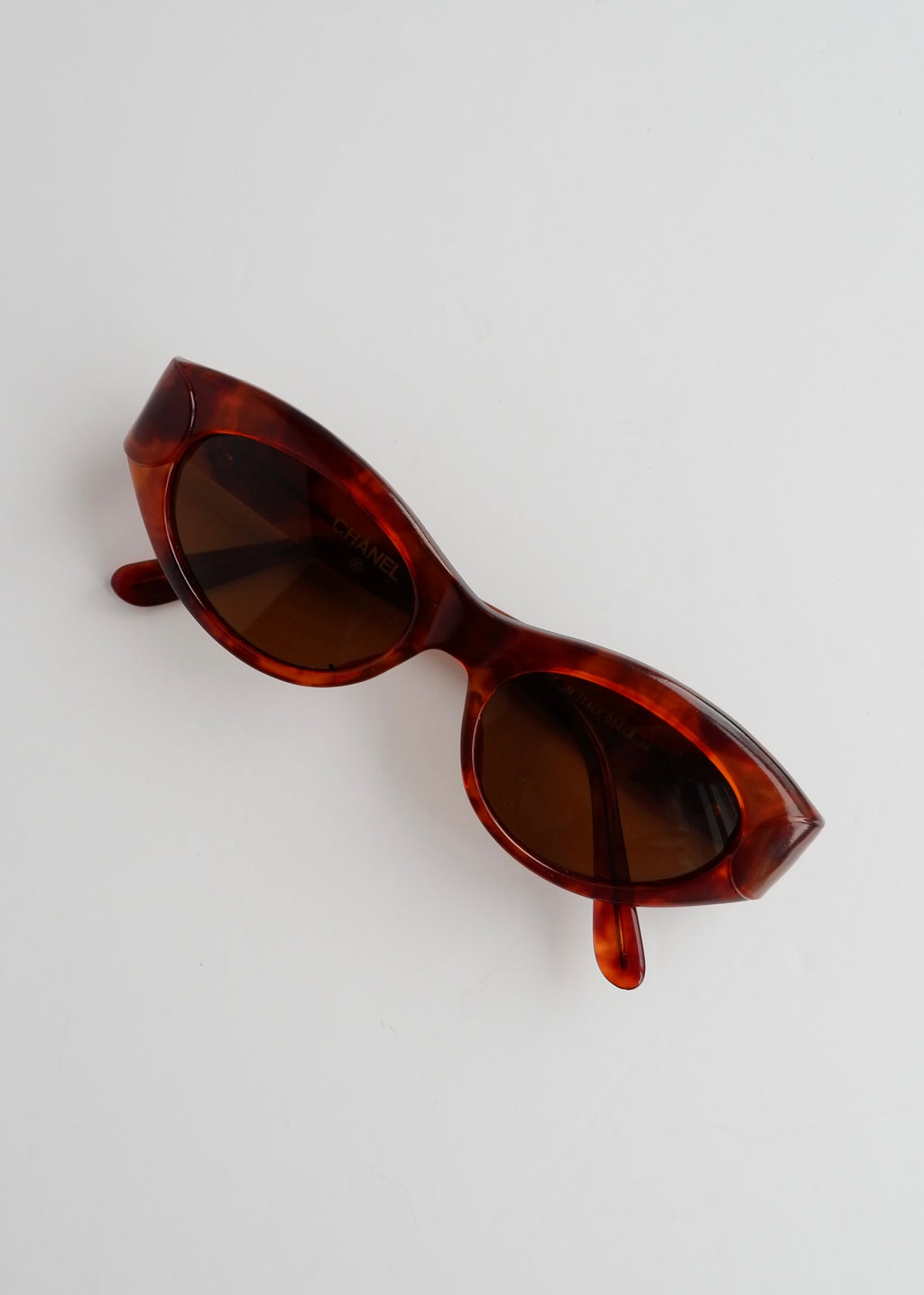 Authentiques lunettes de soleil Chanel d'occasion marron écaille de tortue