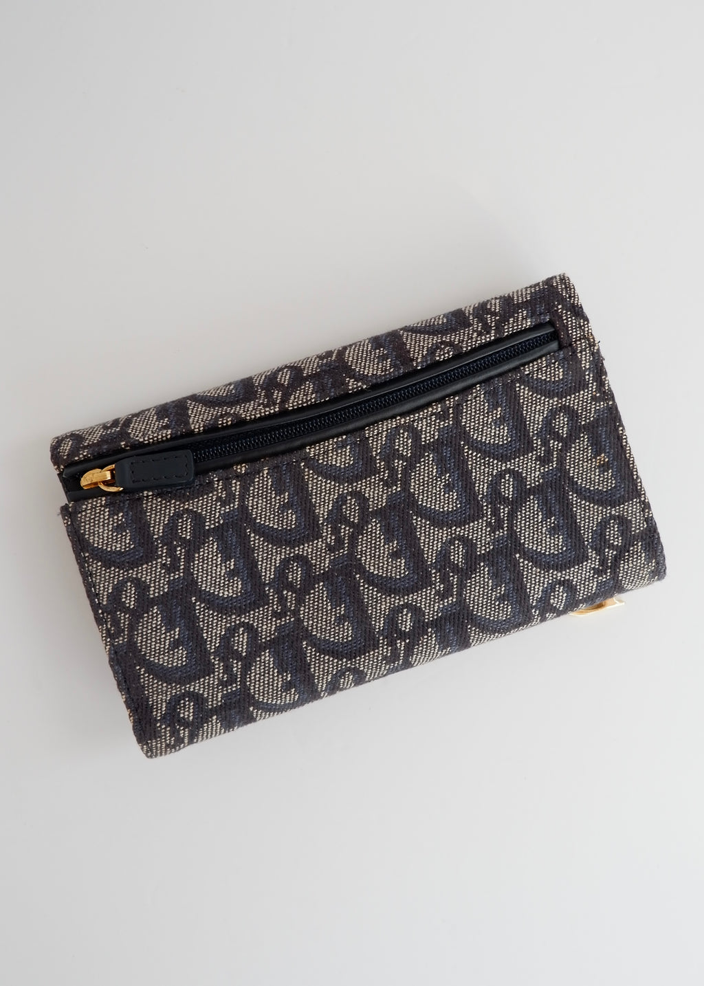 Portefeuille Dior authentique d'occasion en toile trotteur bleu marine